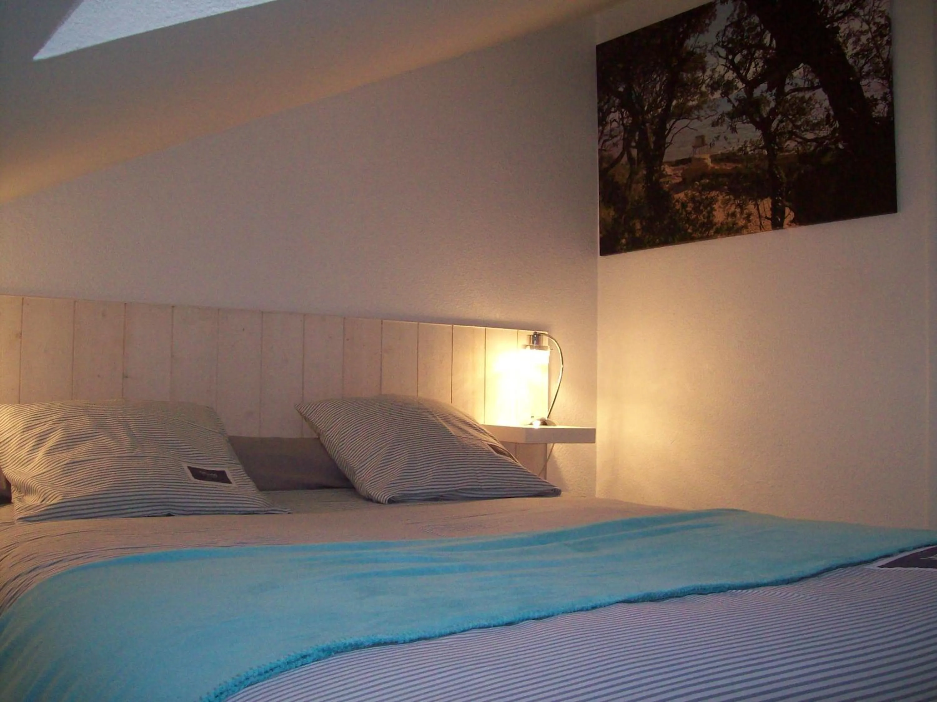 Bed in Appartements Les remparts d'Alienor