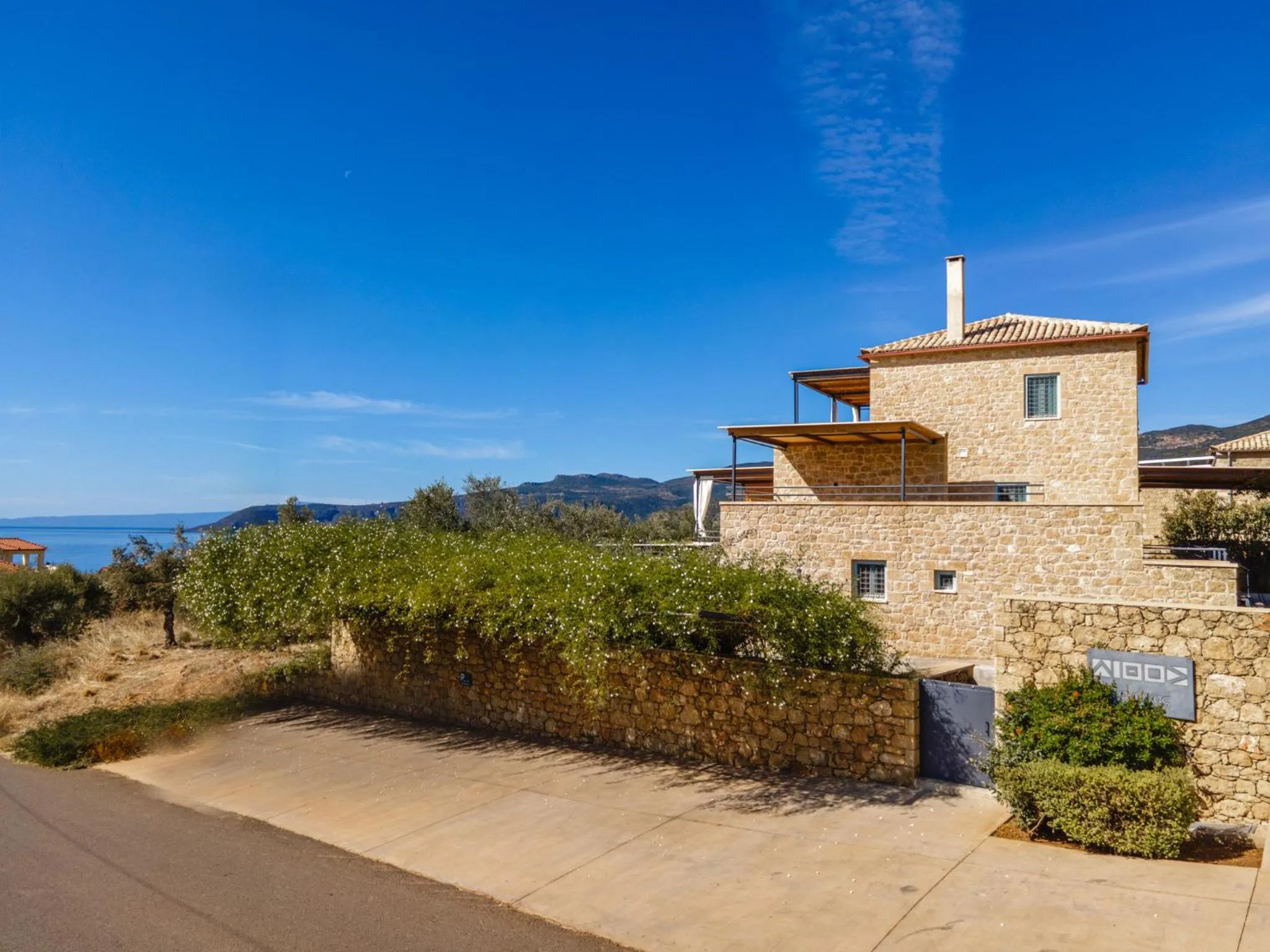 Property building in Lithos Guesthouse Kardamili