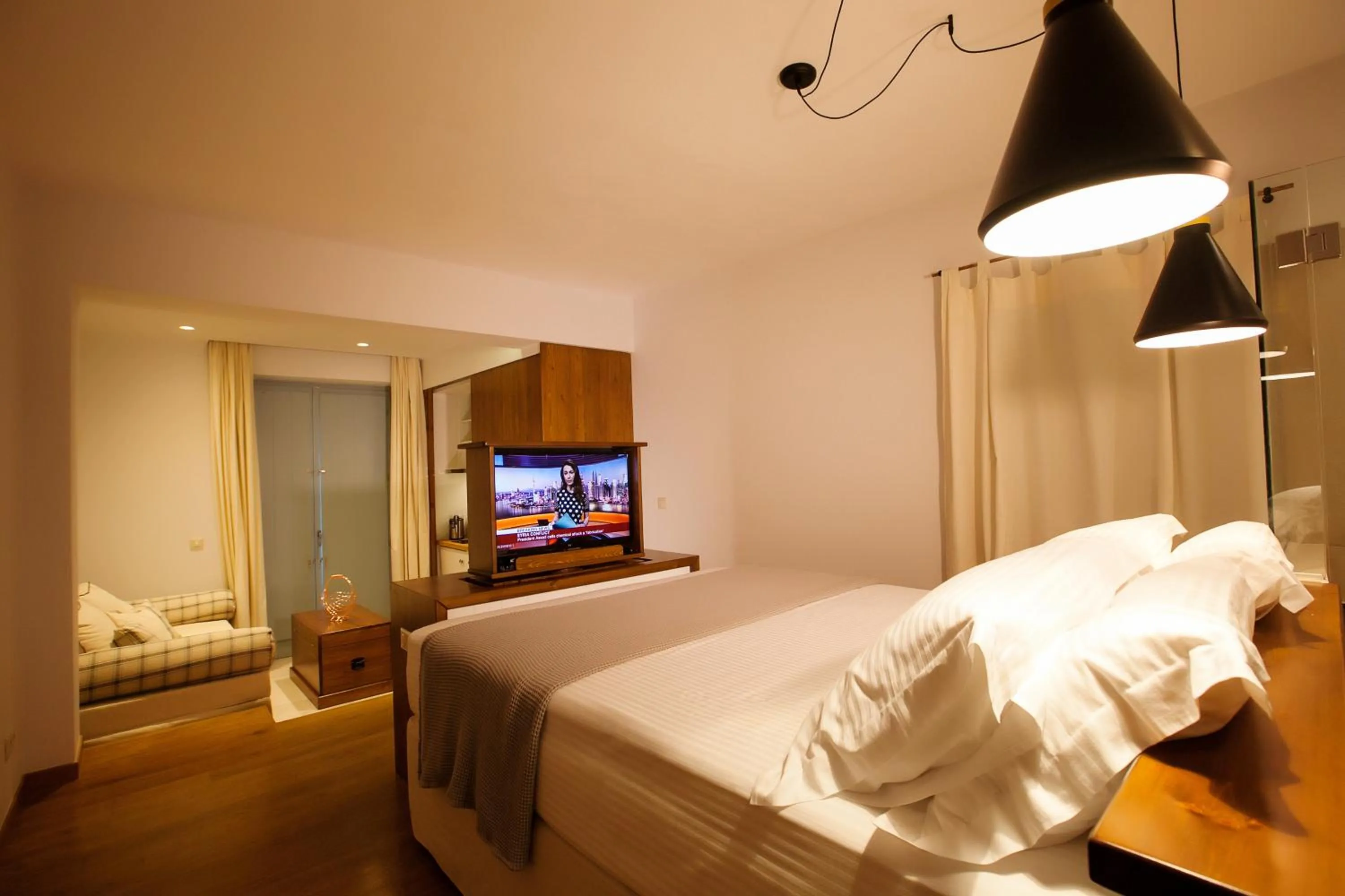 Bed in Lithos Guesthouse Kardamili