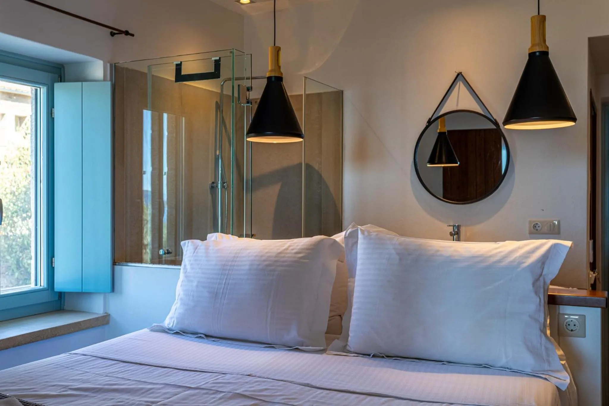 Bed in Lithos Guesthouse Kardamili