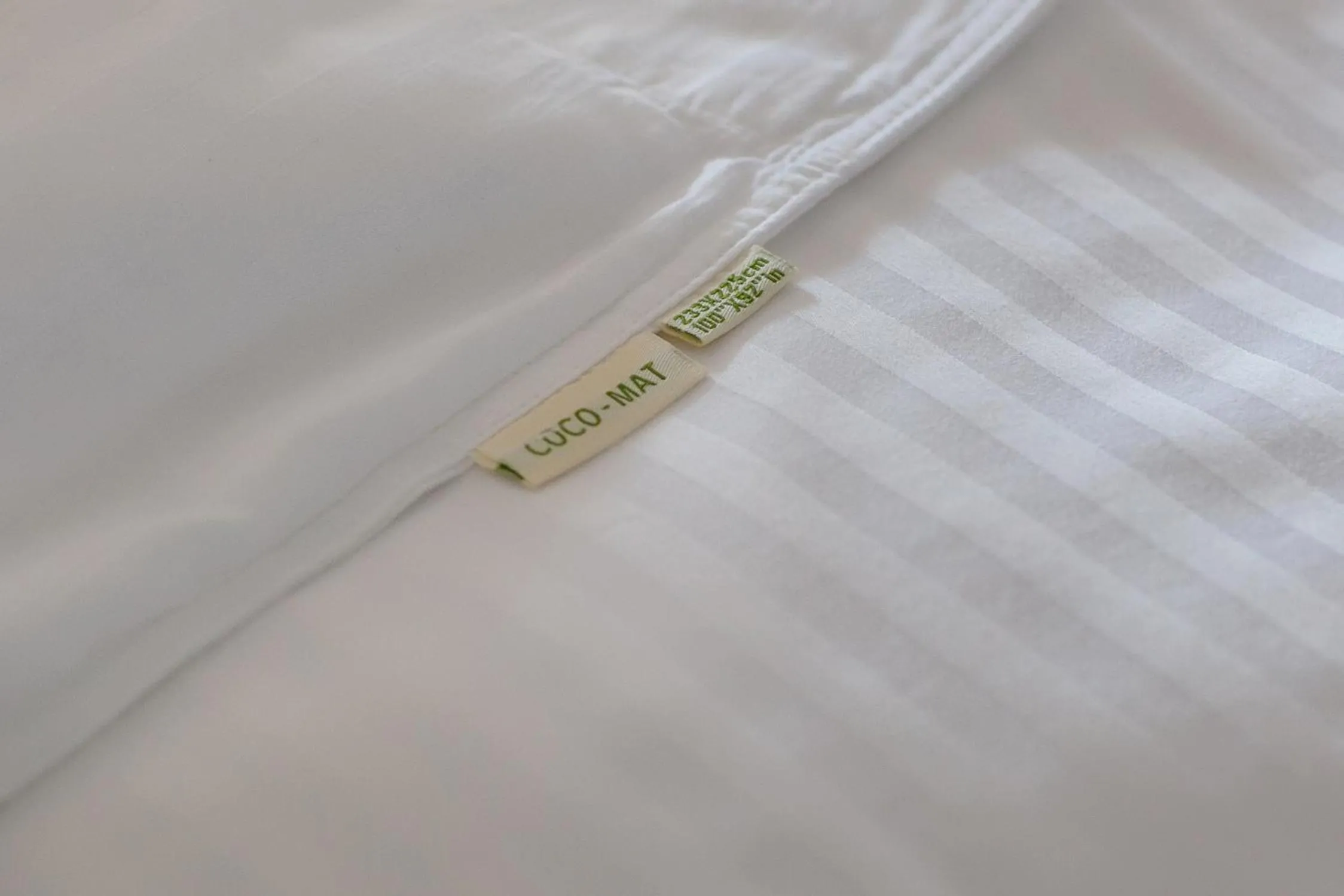 Bed in Lithos Guesthouse Kardamili
