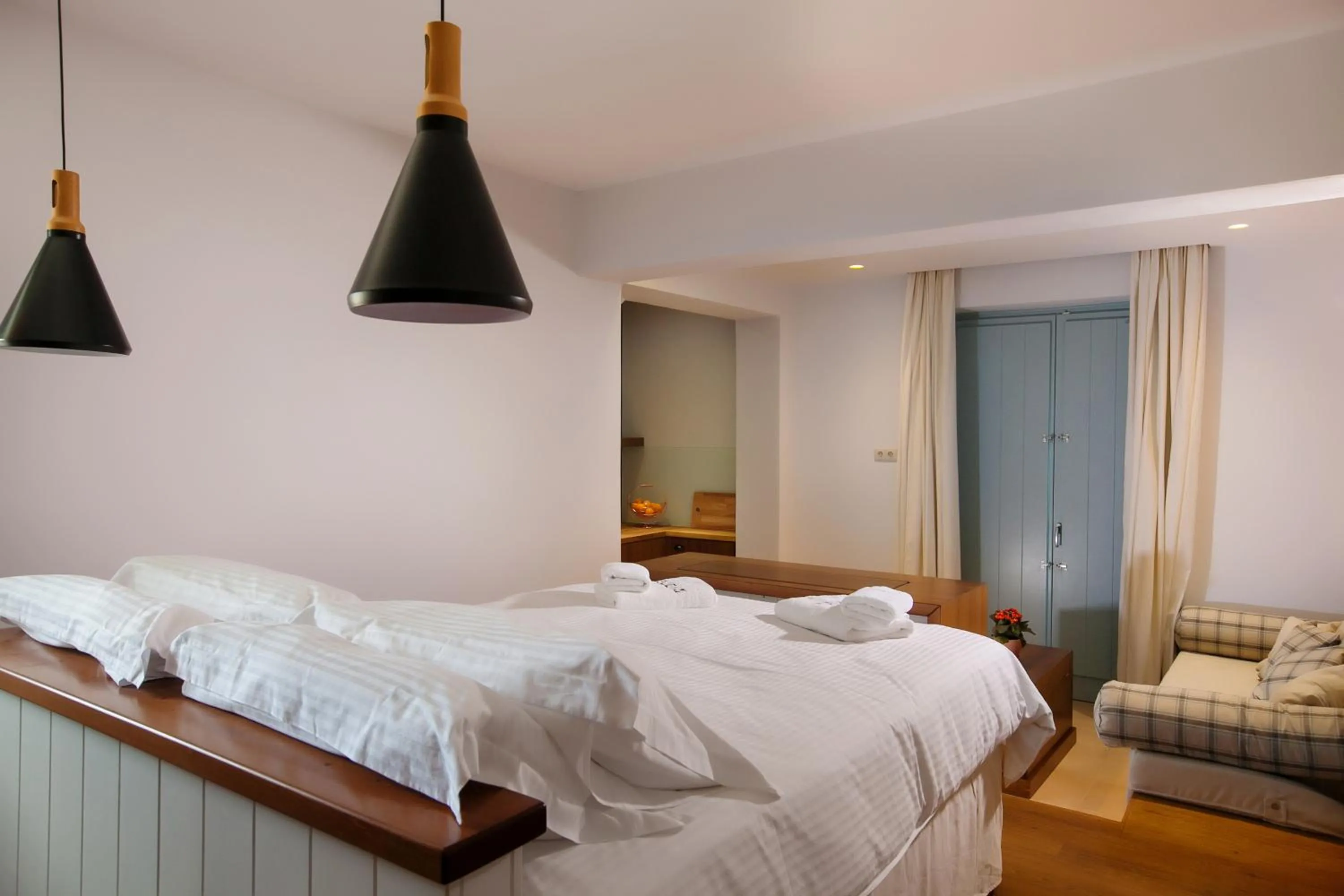 Bed in Lithos Guesthouse Kardamili
