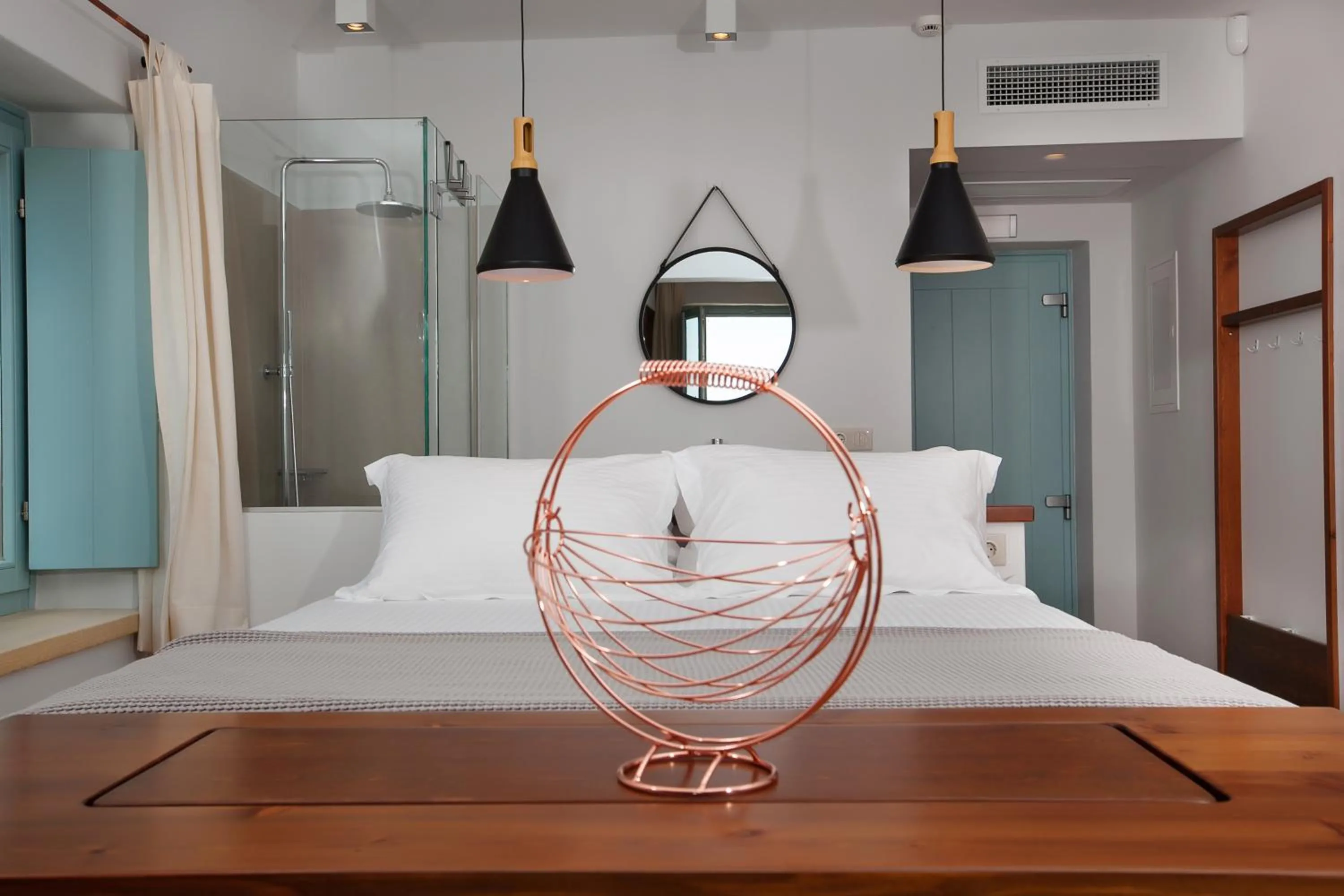 Bed in Lithos Guesthouse Kardamili