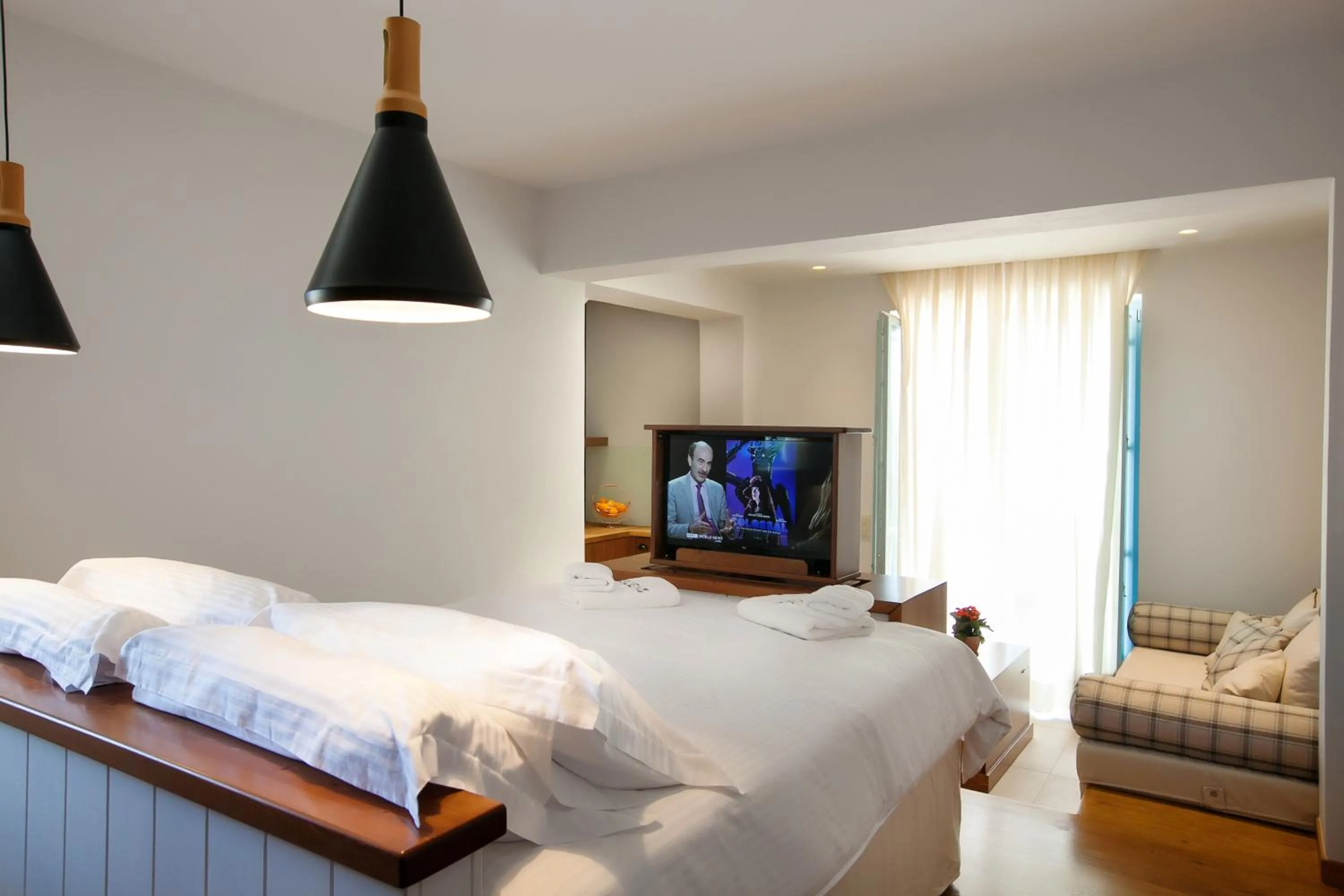 Bed in Lithos Guesthouse Kardamili