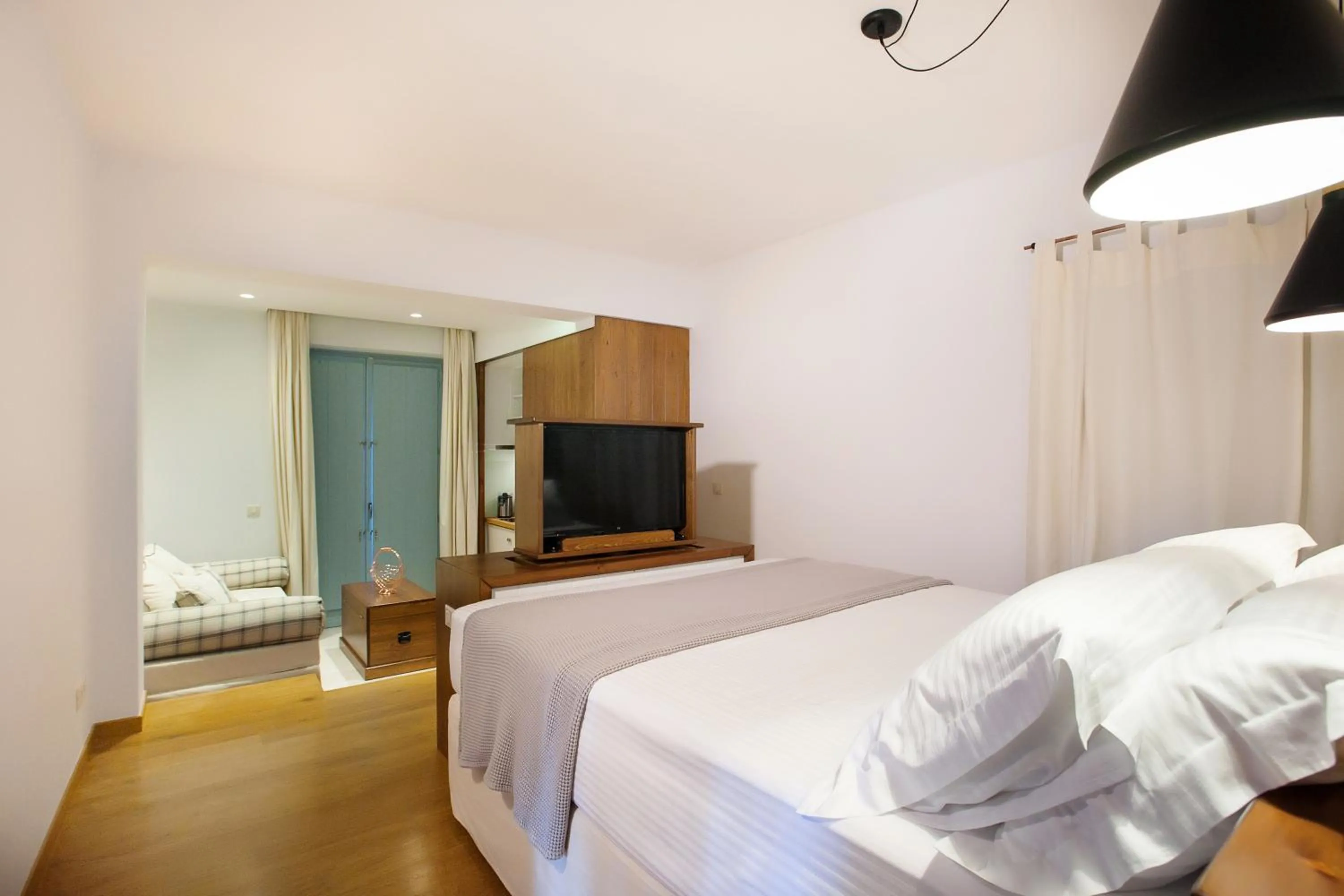 Bed in Lithos Guesthouse Kardamili
