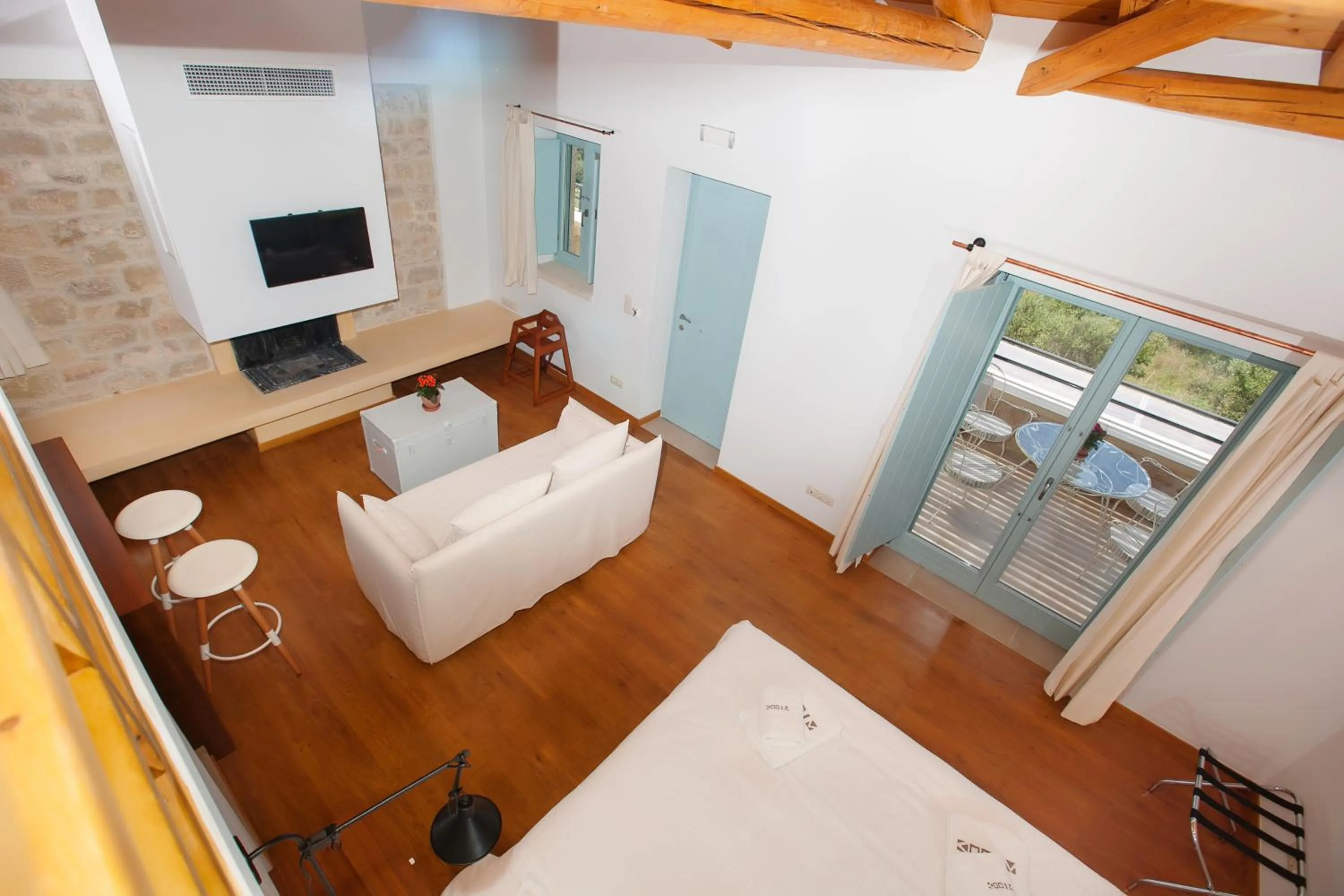 Bed in Lithos Guesthouse Kardamili