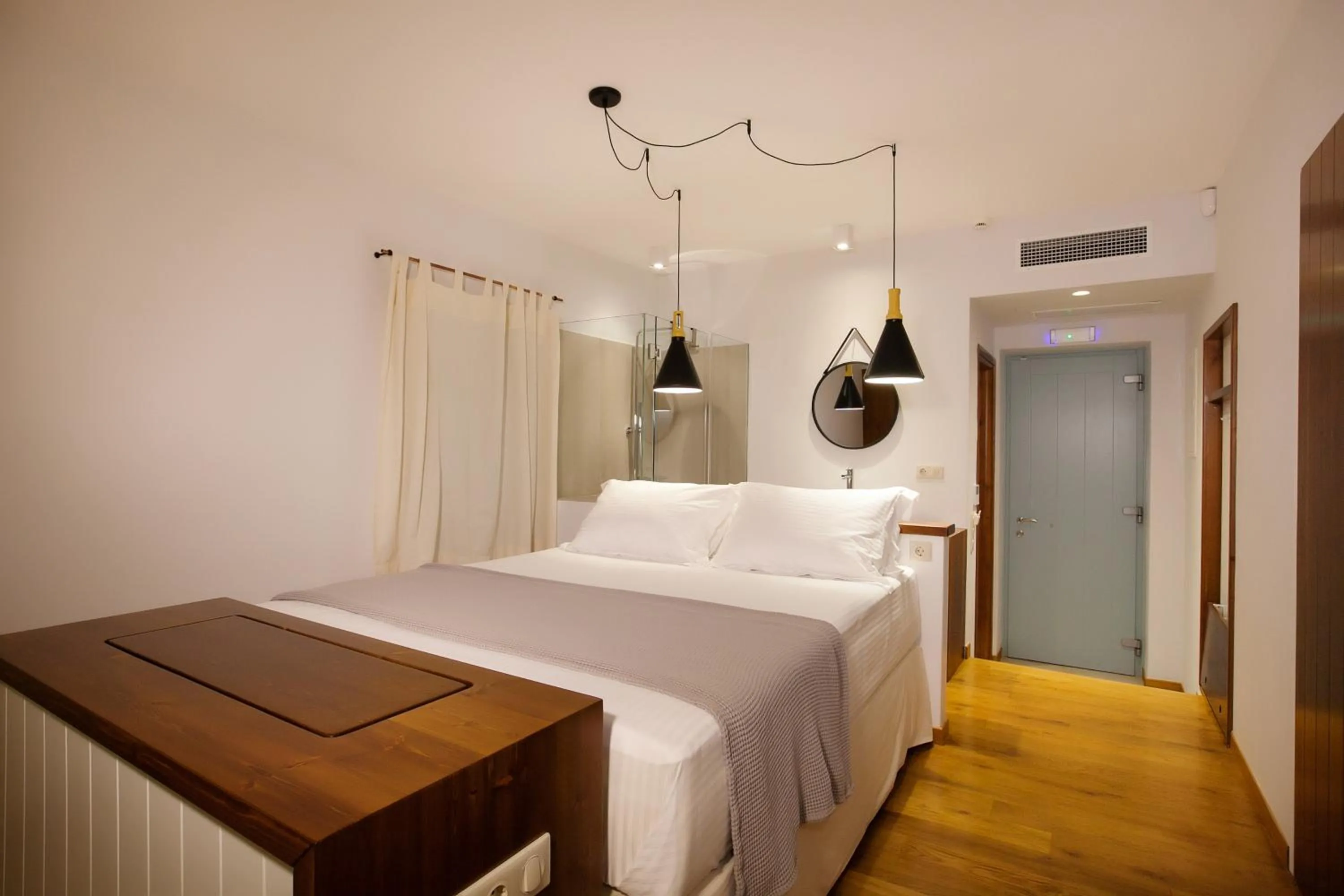 Bed in Lithos Guesthouse Kardamili
