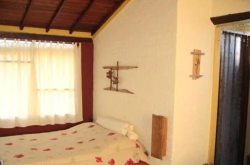 Bed in Pousada Serra da Paz