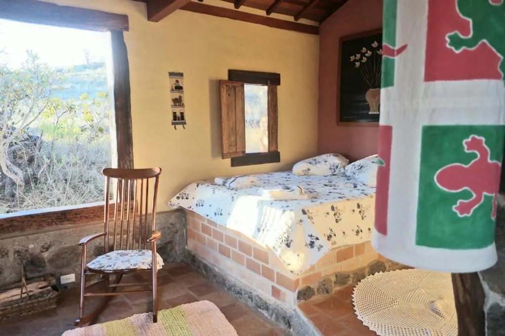 Bed in Pousada Serra da Paz