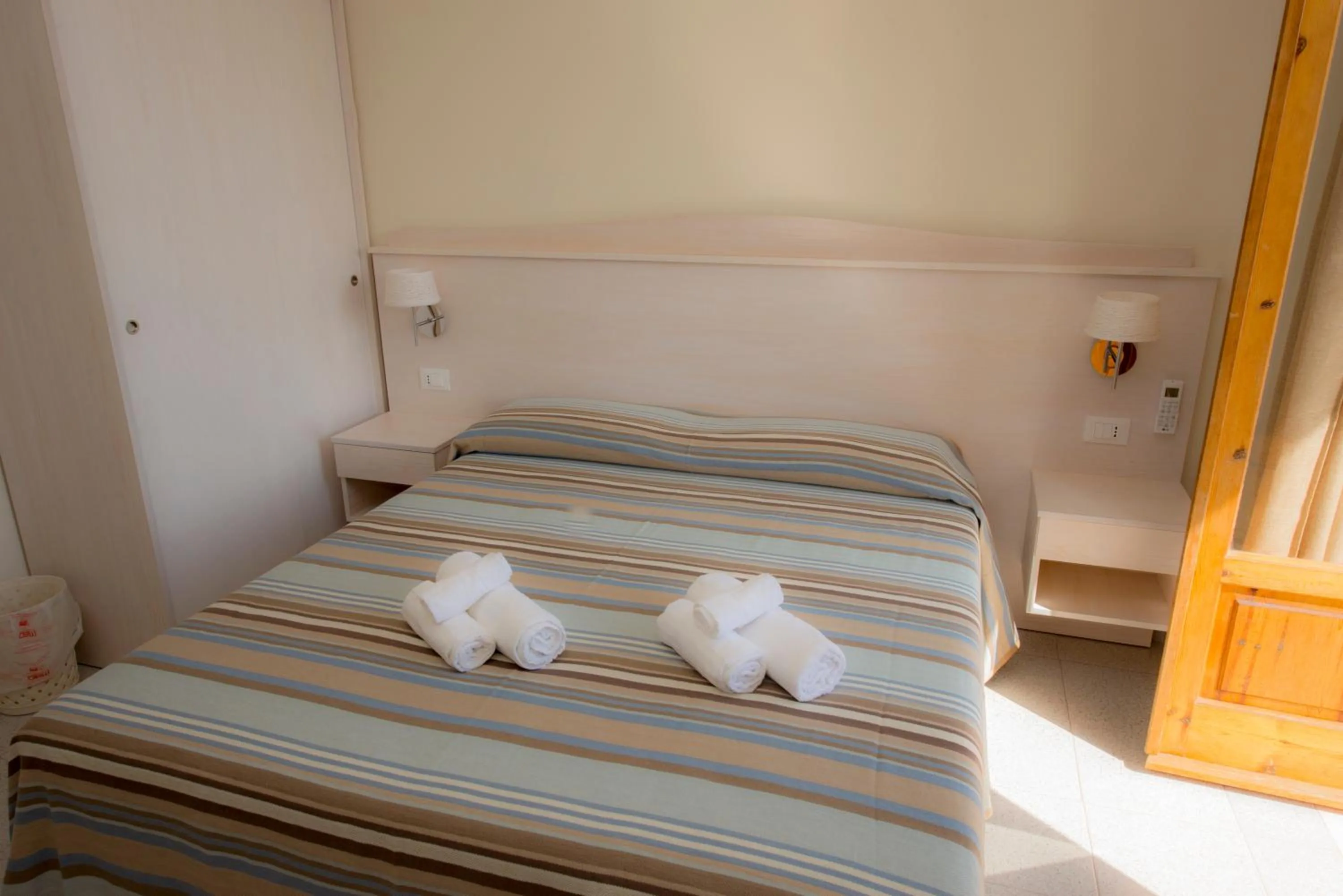 Bed in Donna Rosa Accommodation