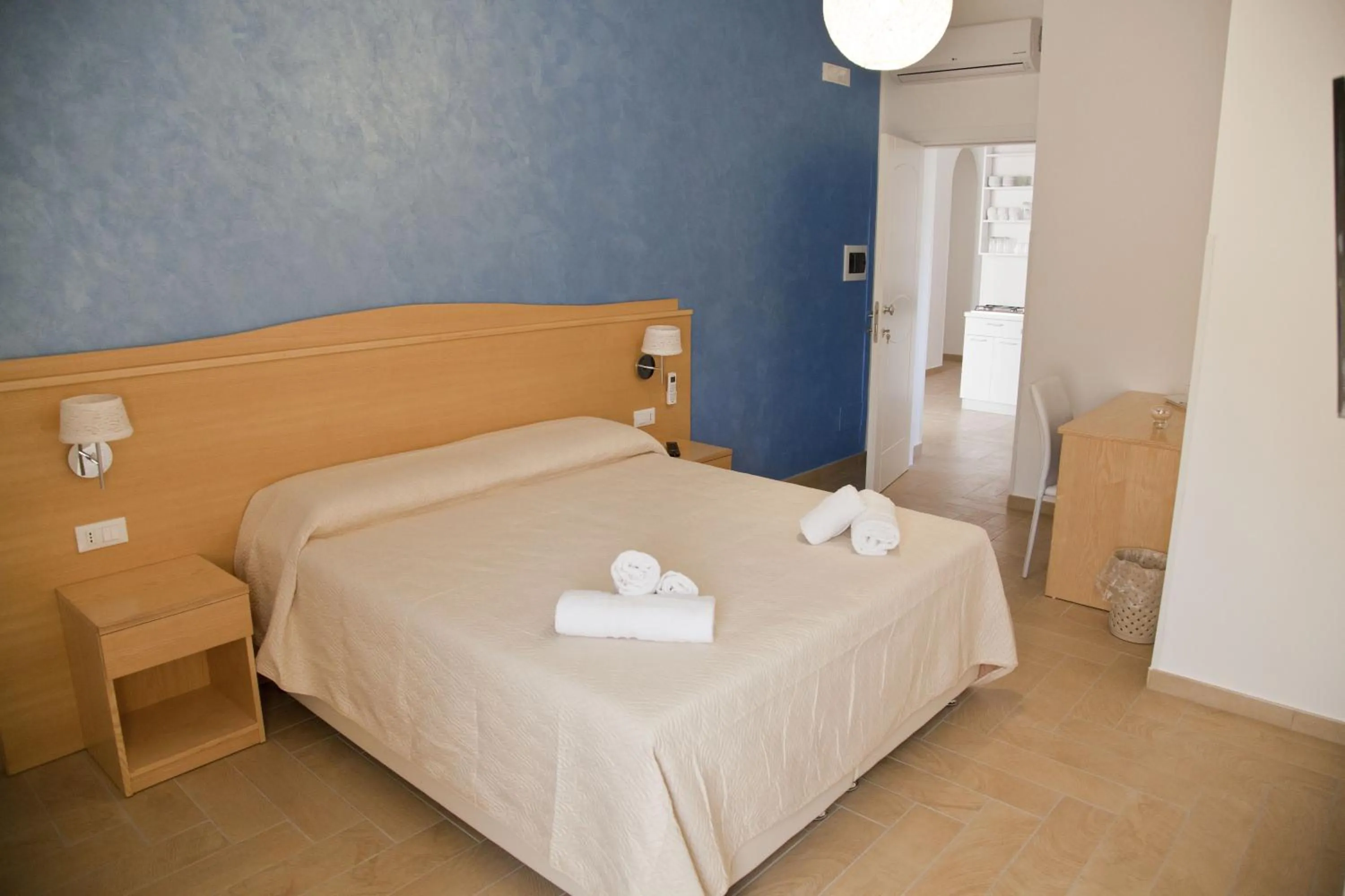 Bed in Donna Rosa Accommodation