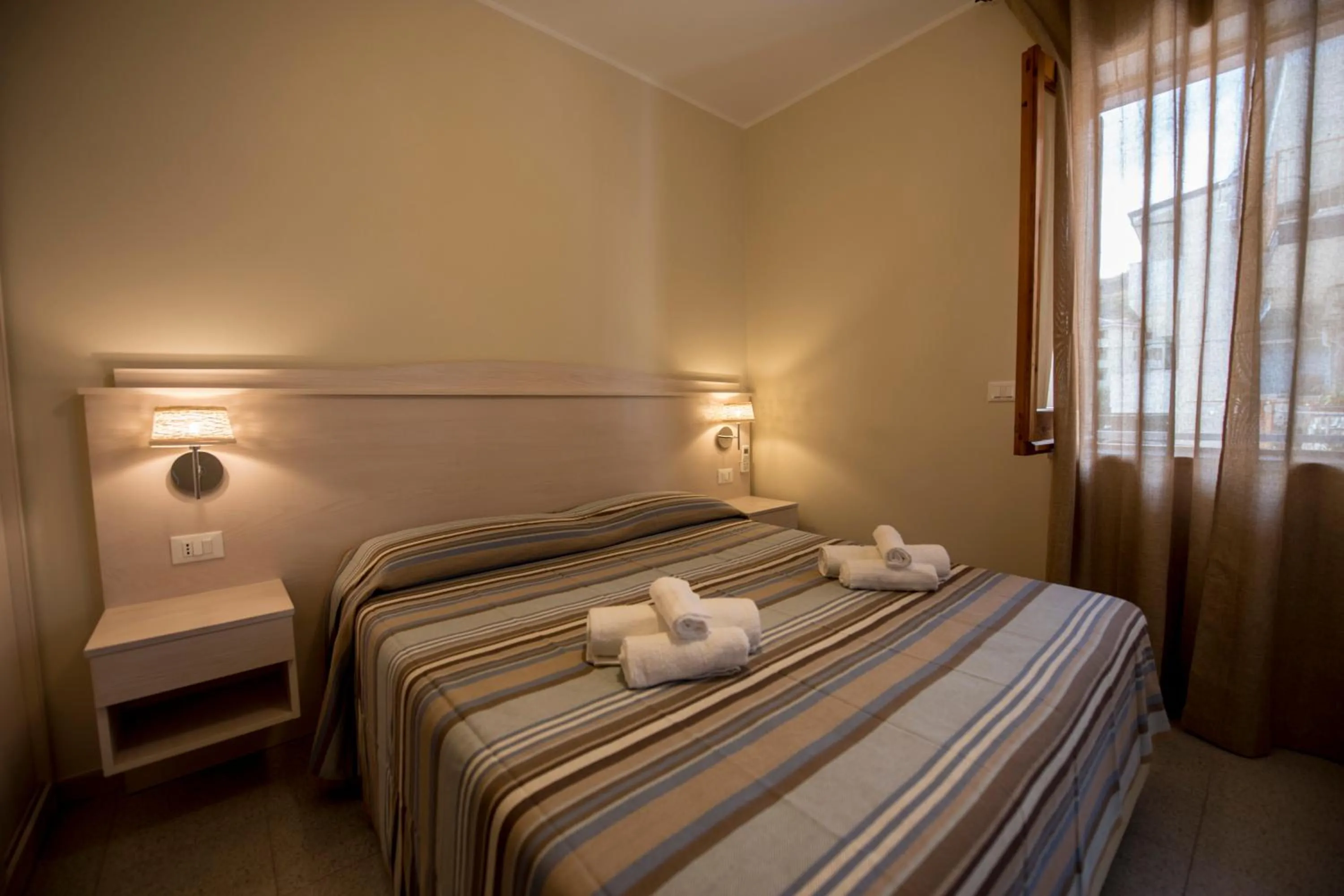 Bed in Donna Rosa Accommodation