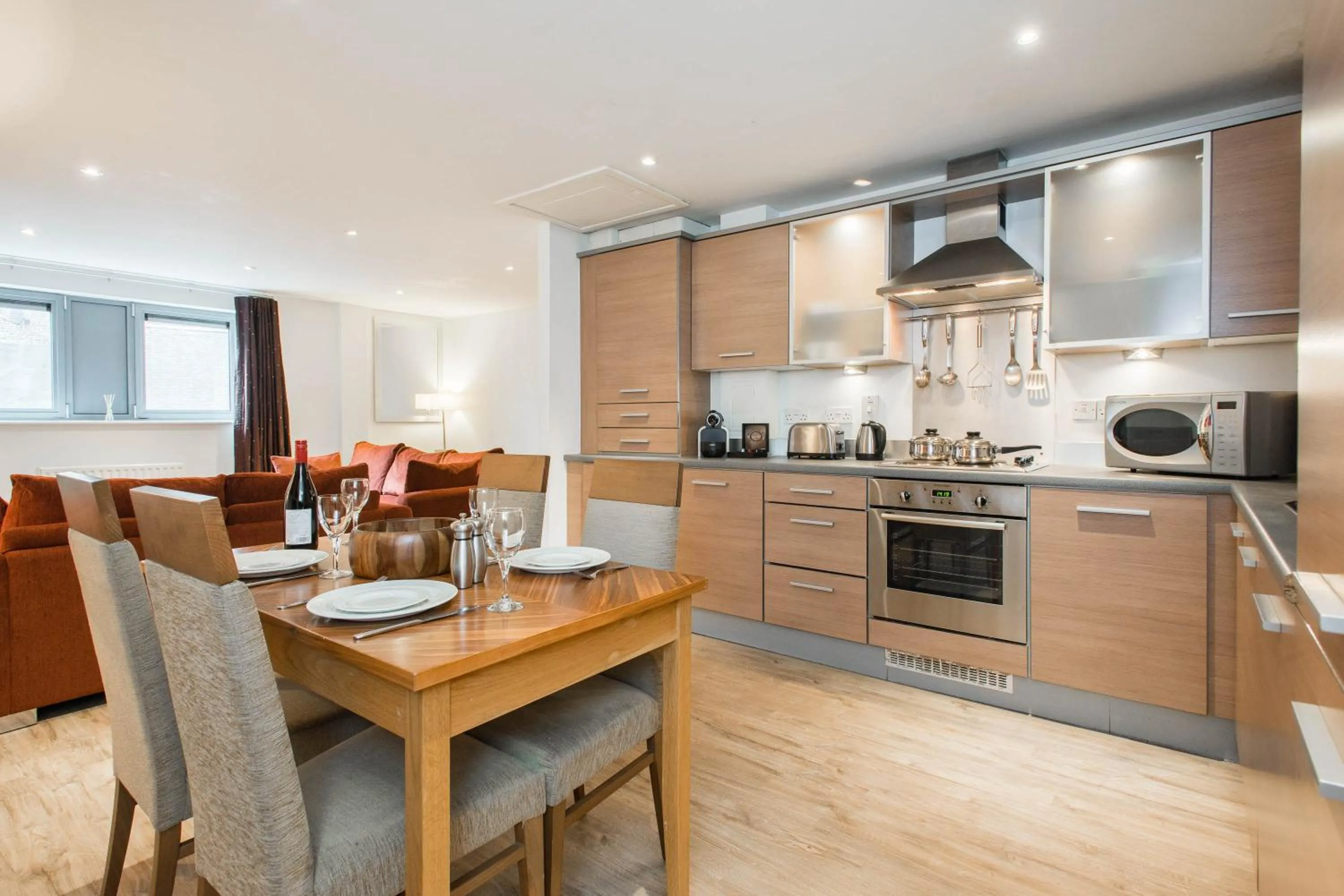 Kitchen or kitchenette in PREMIER SUITES Newcastle