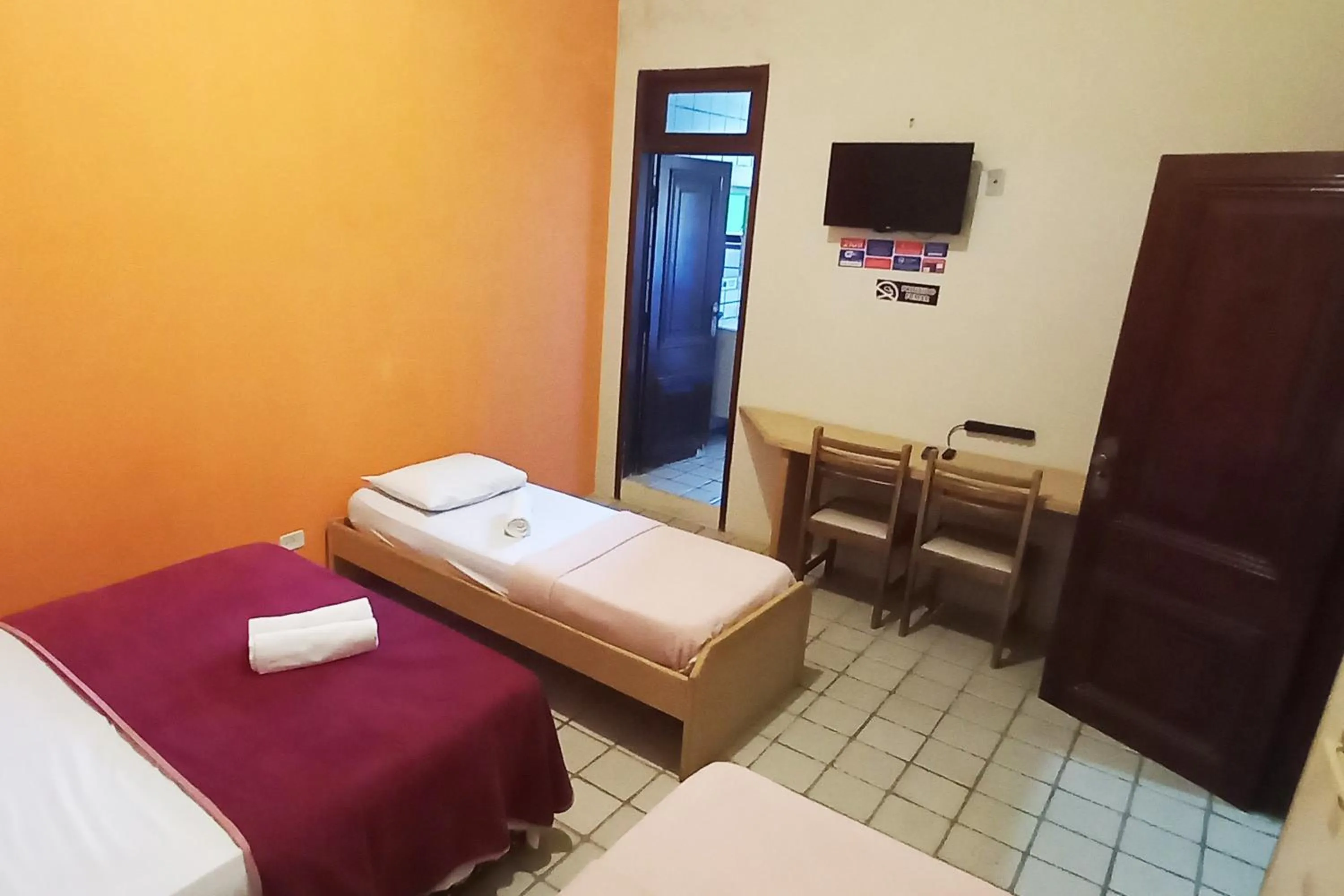 Bed in Pousada Casa Grande