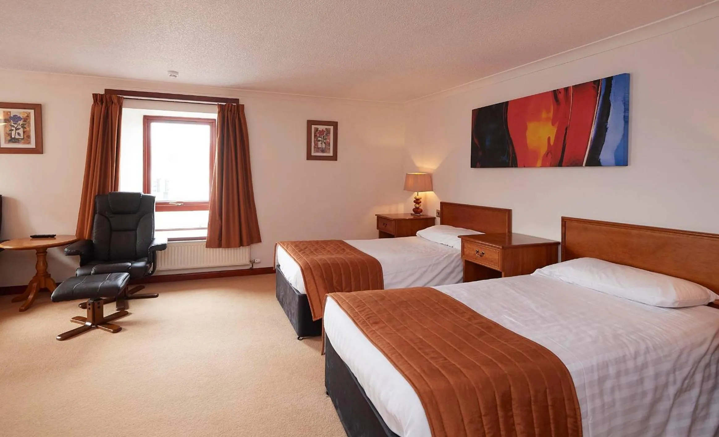 Bed in The Priory Hotel