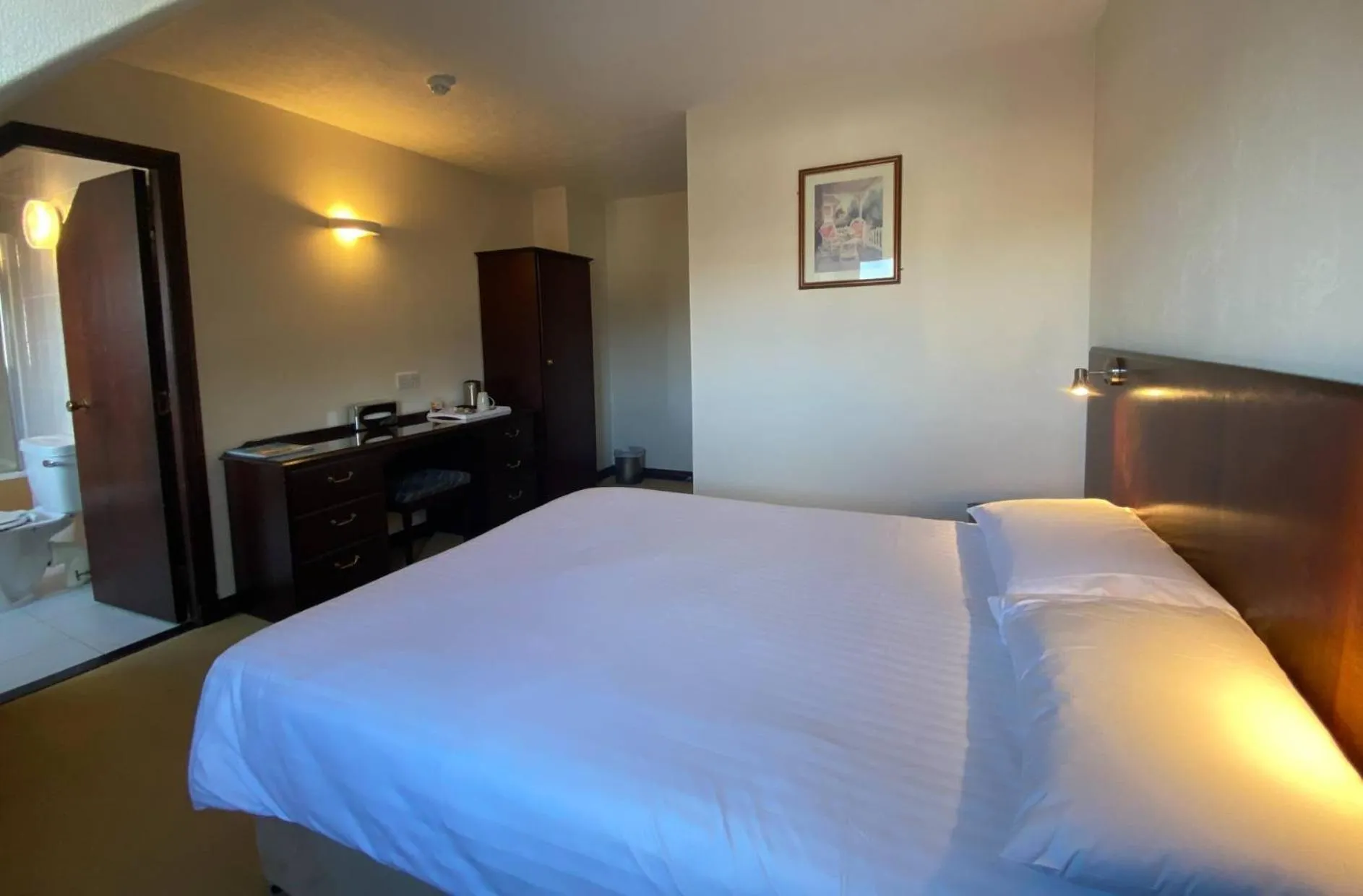 Bed in The Priory Hotel