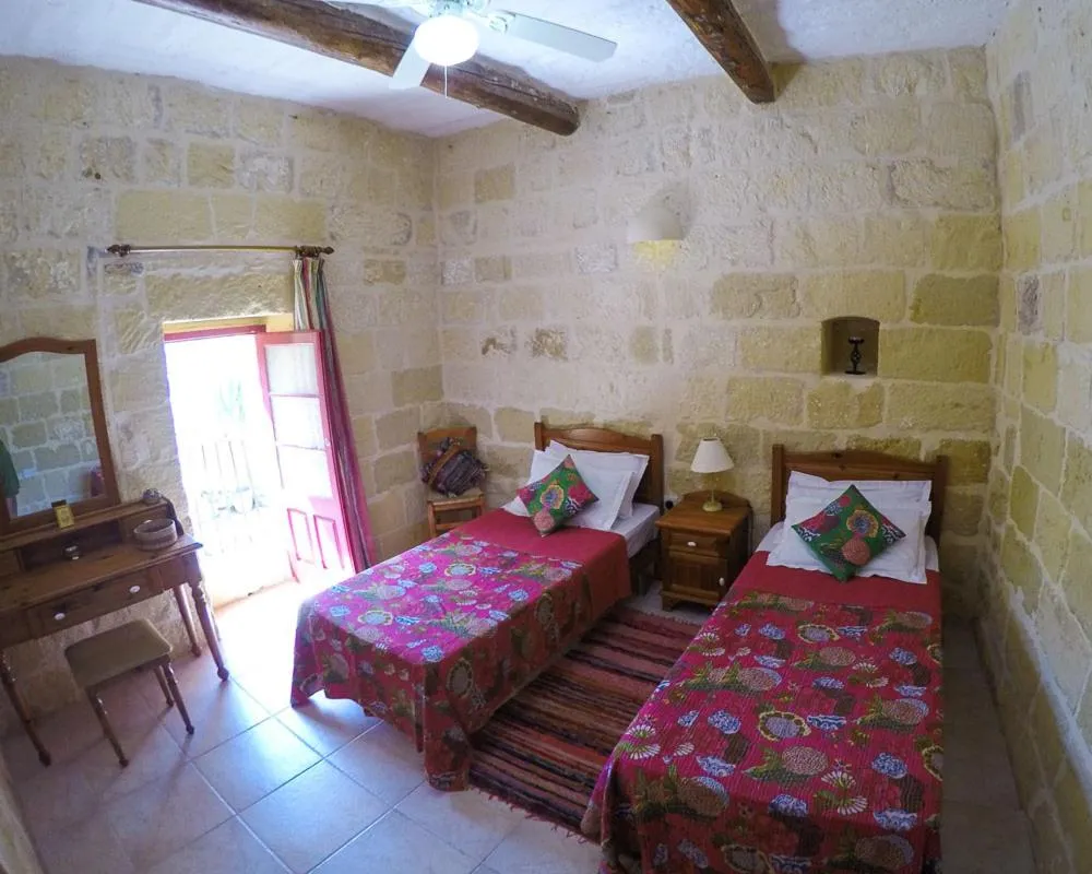 Photo of the whole room, Bed in Shanti Ghar Gozo