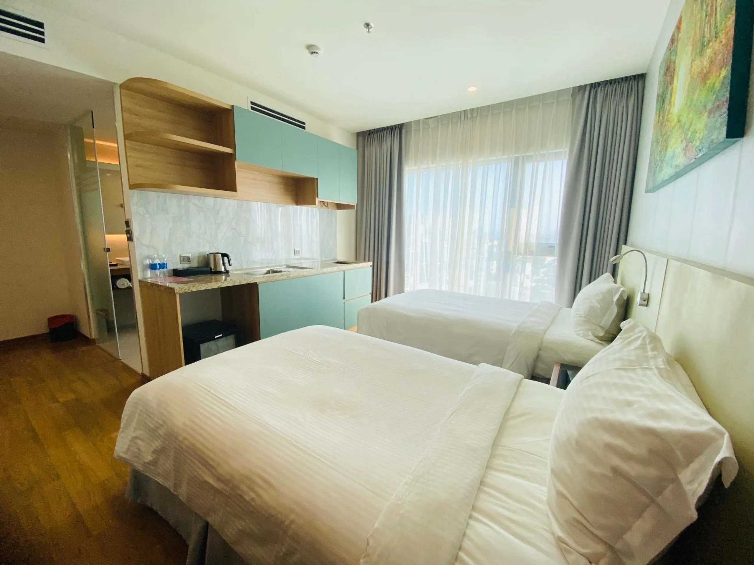 Bed in NAM Hotel & Residences