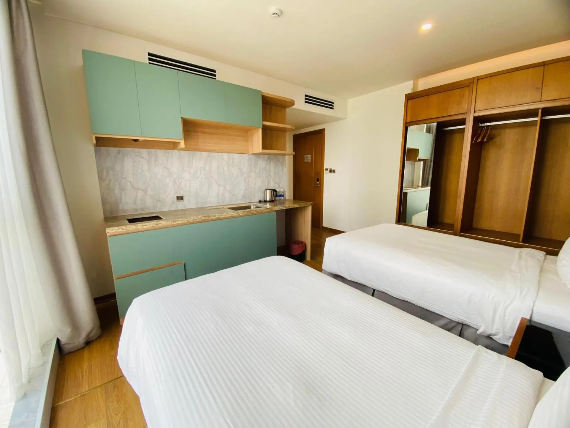 Bed in NAM Hotel & Residences