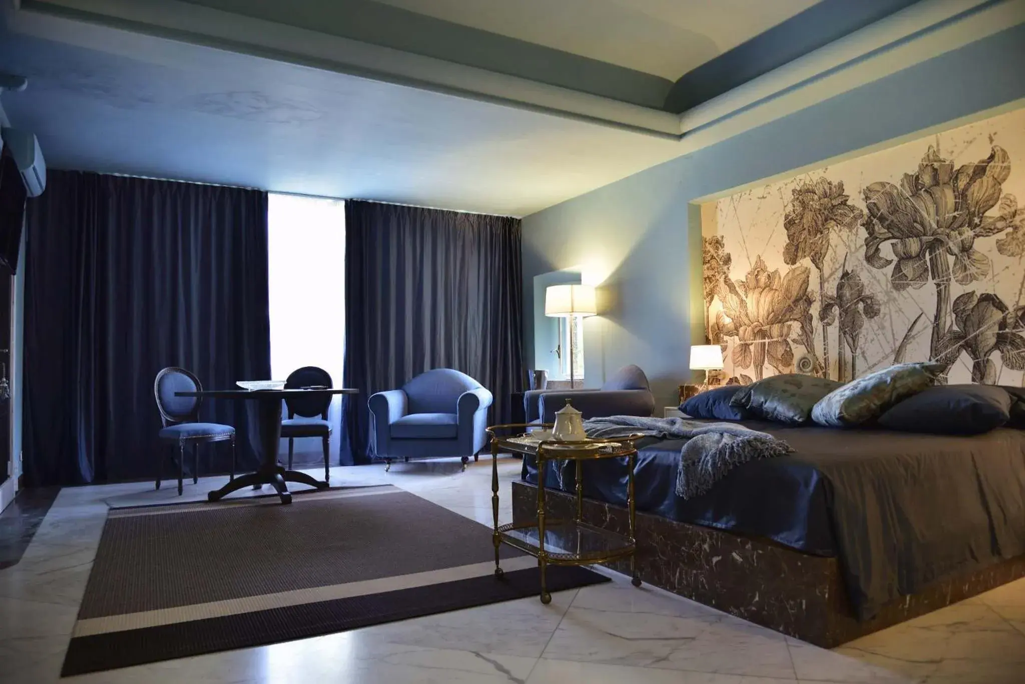 Deluxe Junior Suite in Villa Ottolenghi Wedekind Deluxe Junior Suite in Villa Ottolenghi Wedekind