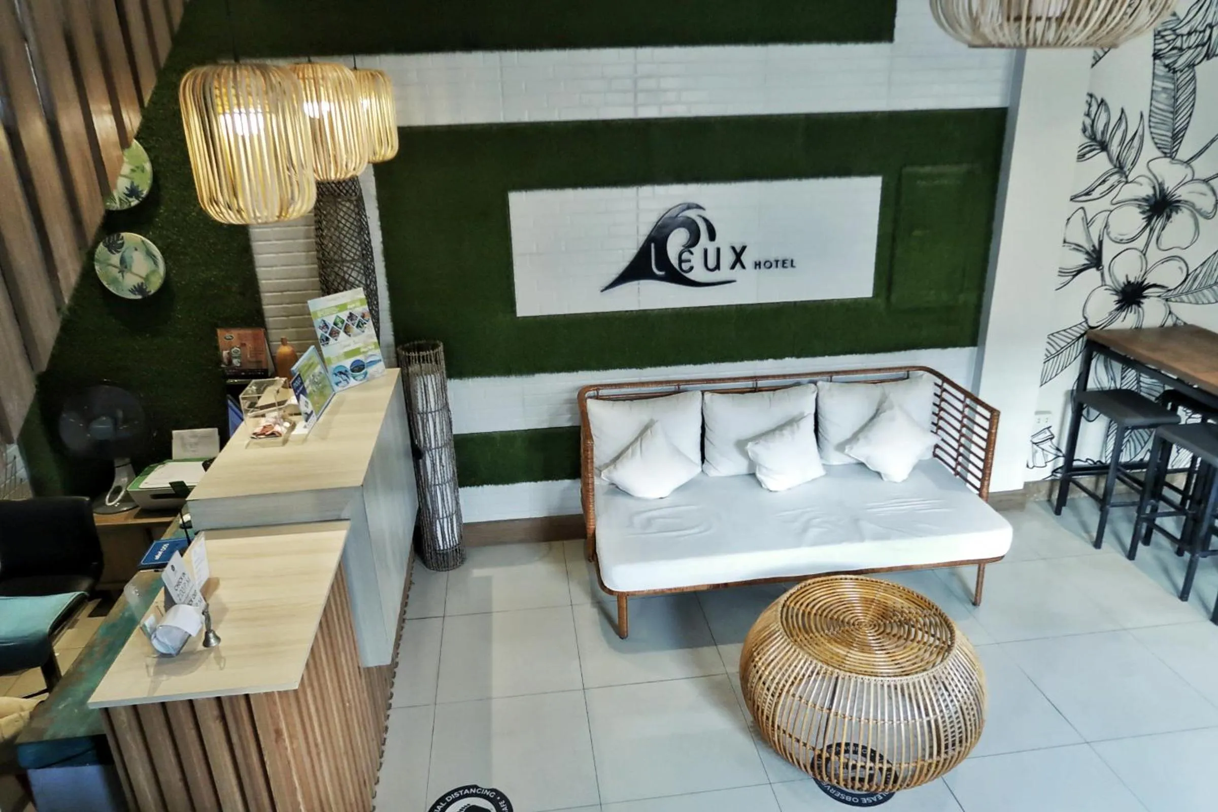 Seating area, Bed in LEUX Hotel Alona Panglao