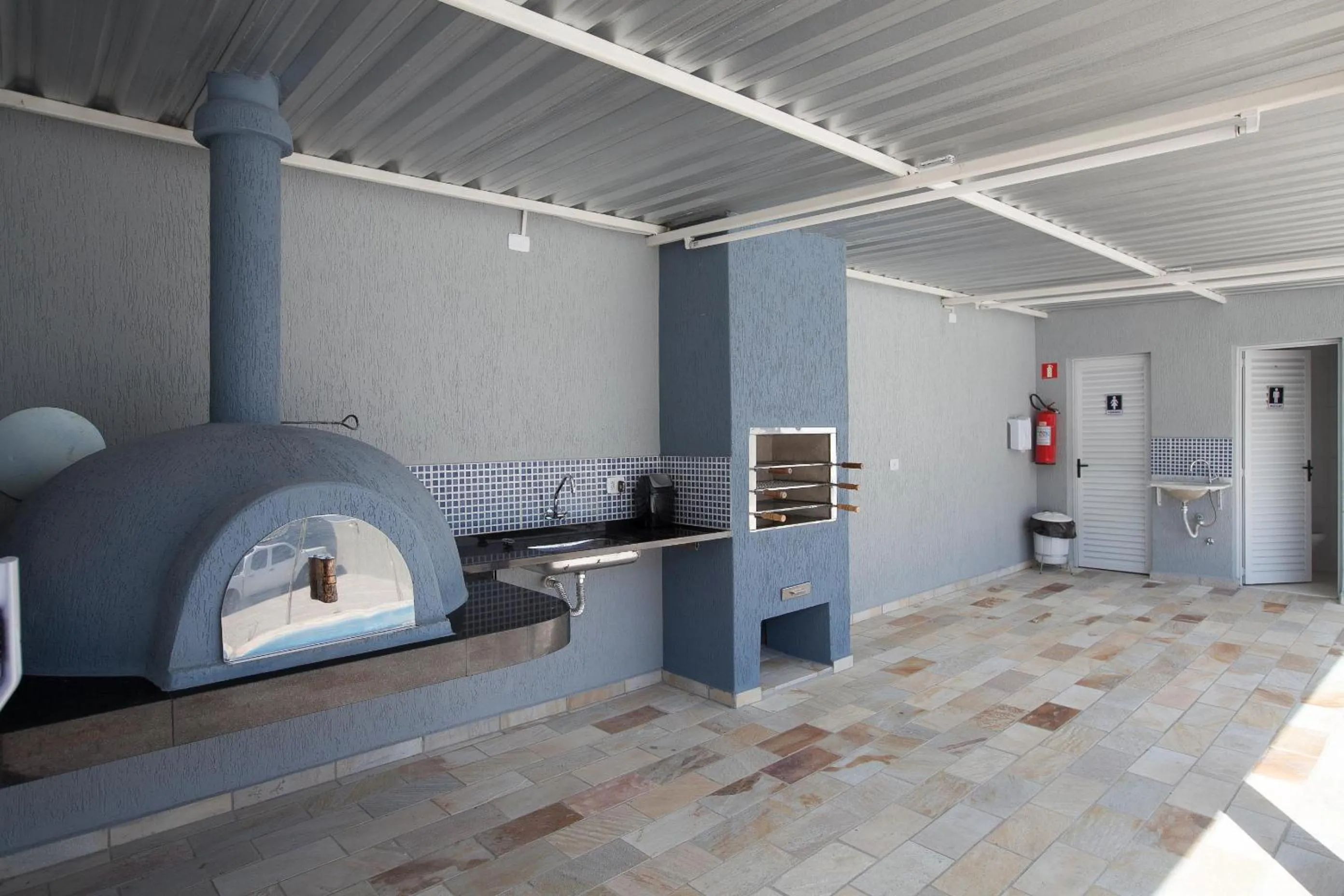 BBQ facilities in Apartamento Erica Itaguá proximo da Praia Grande
