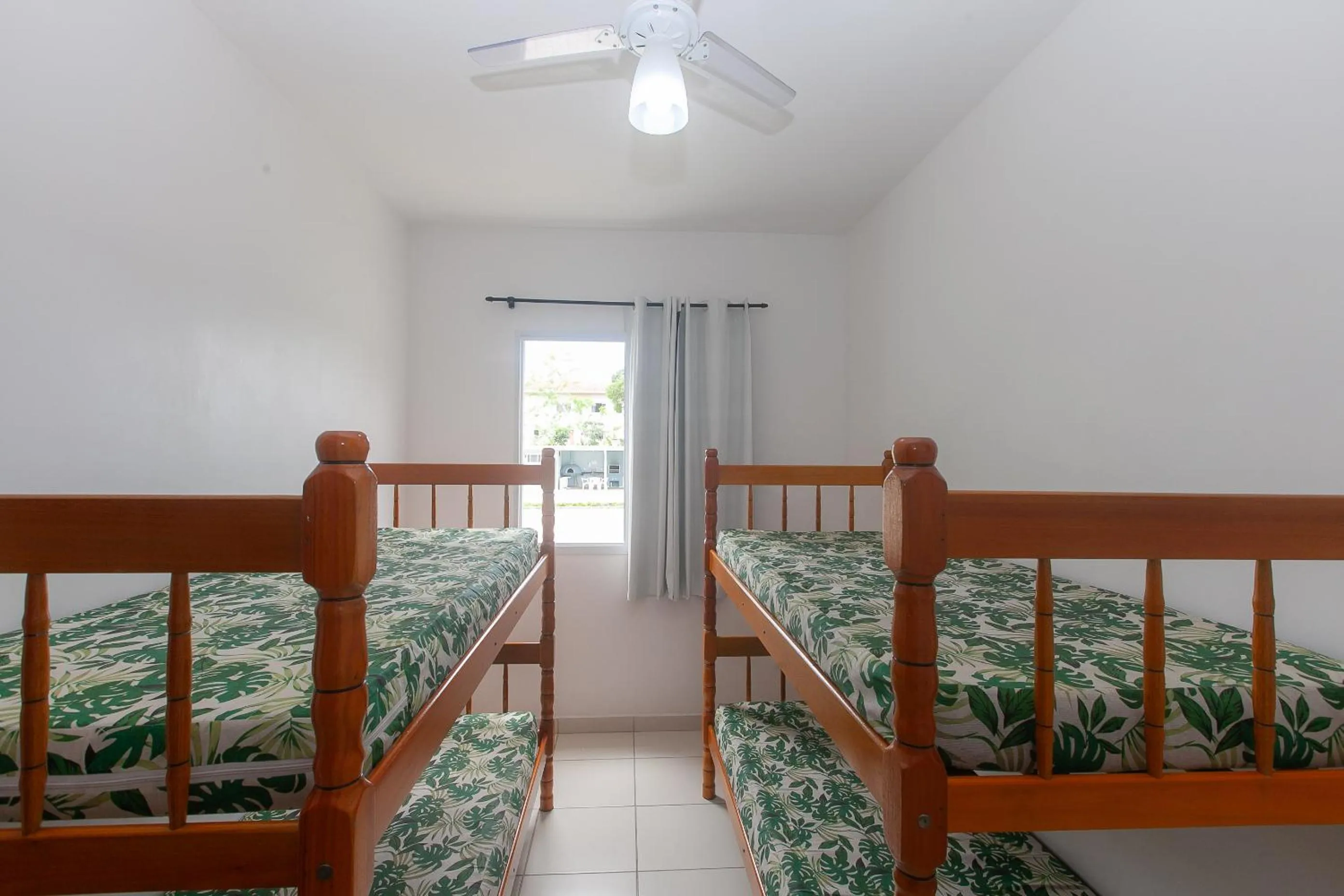 Bedroom, Bed in Apartamento Erica Itaguá proximo da Praia Grande