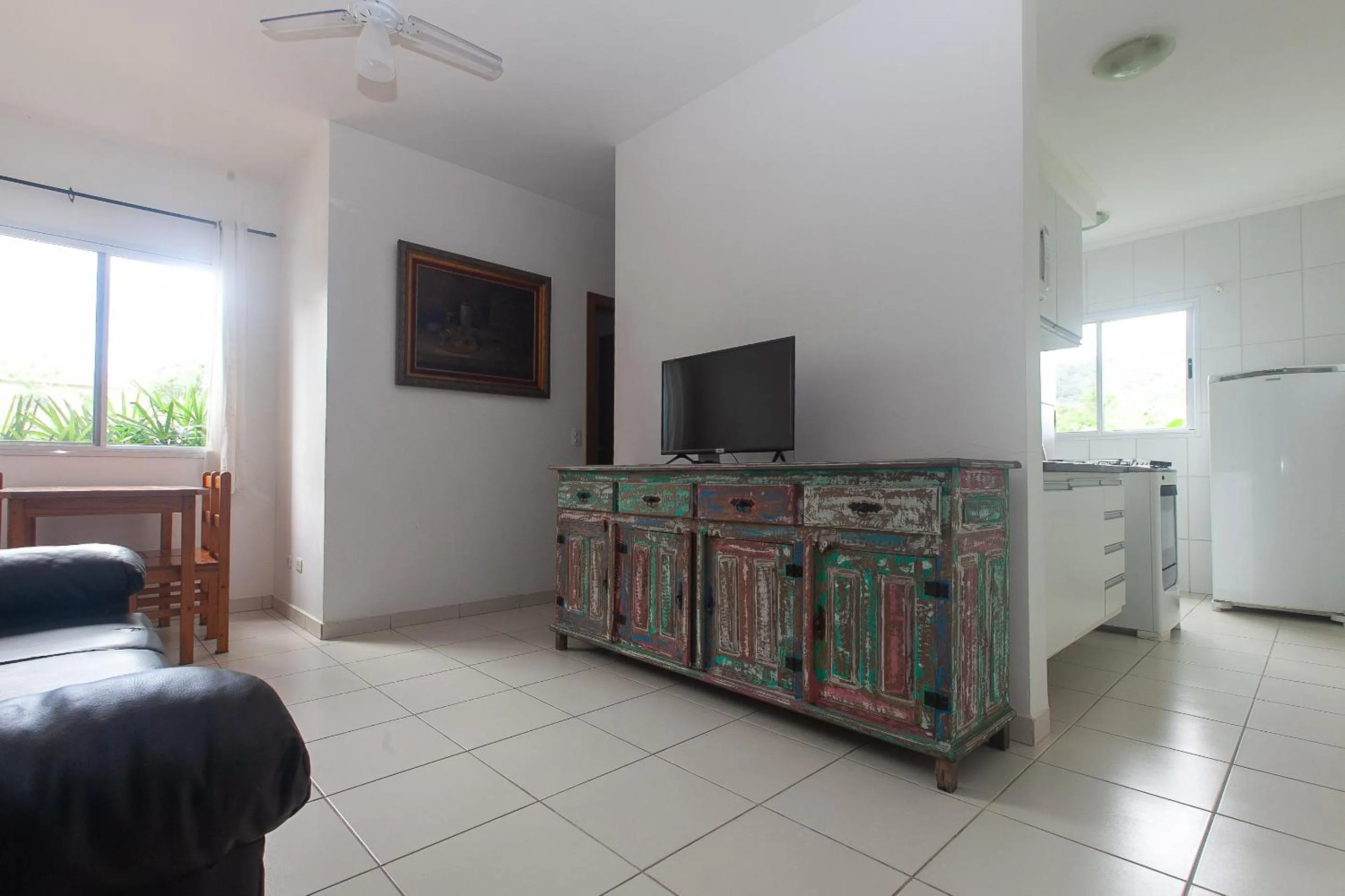Communal lounge/ TV room in Apartamento Erica Itaguá proximo da Praia Grande