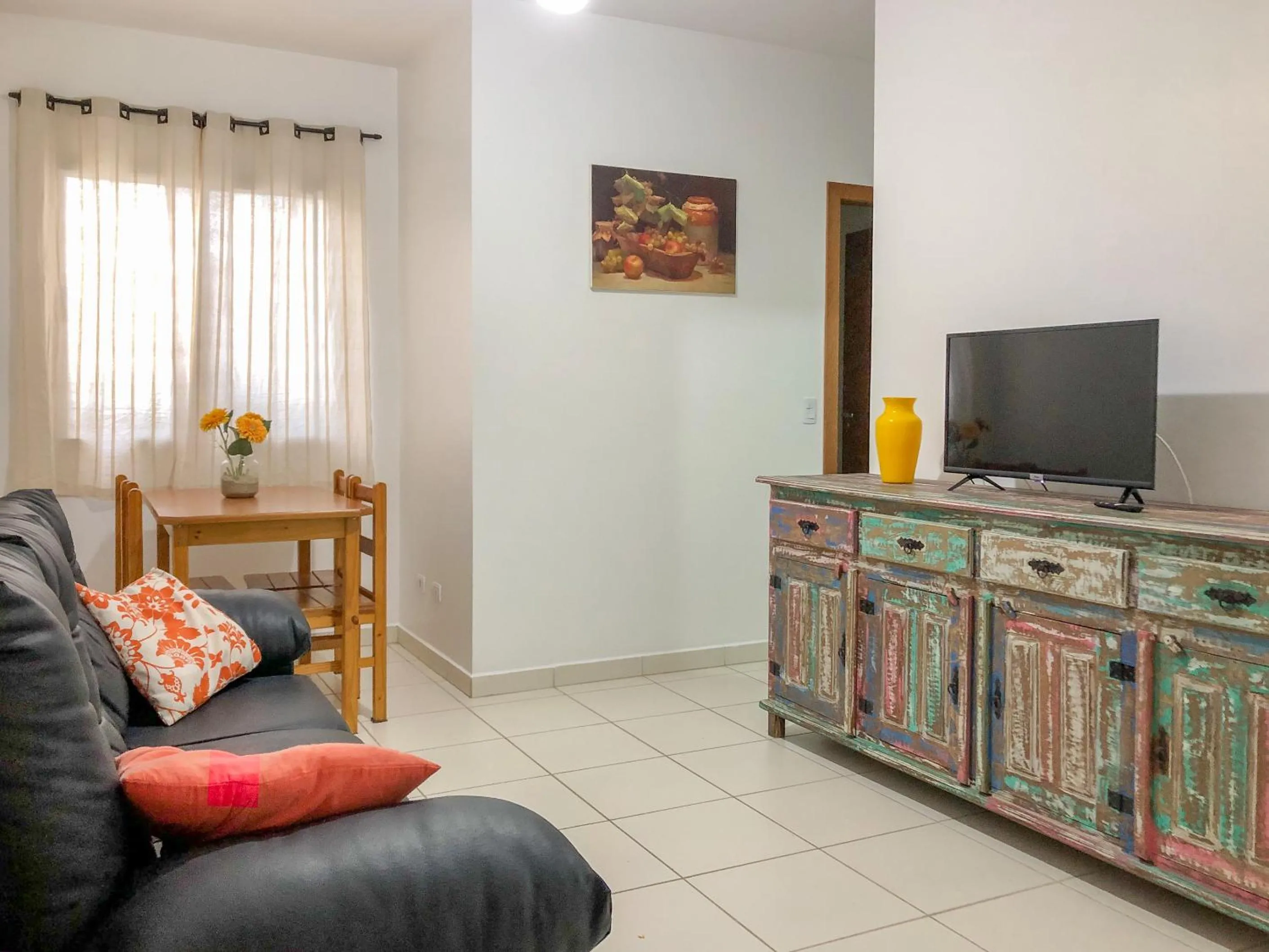 TV and multimedia in Apartamento Erica Itaguá proximo da Praia Grande