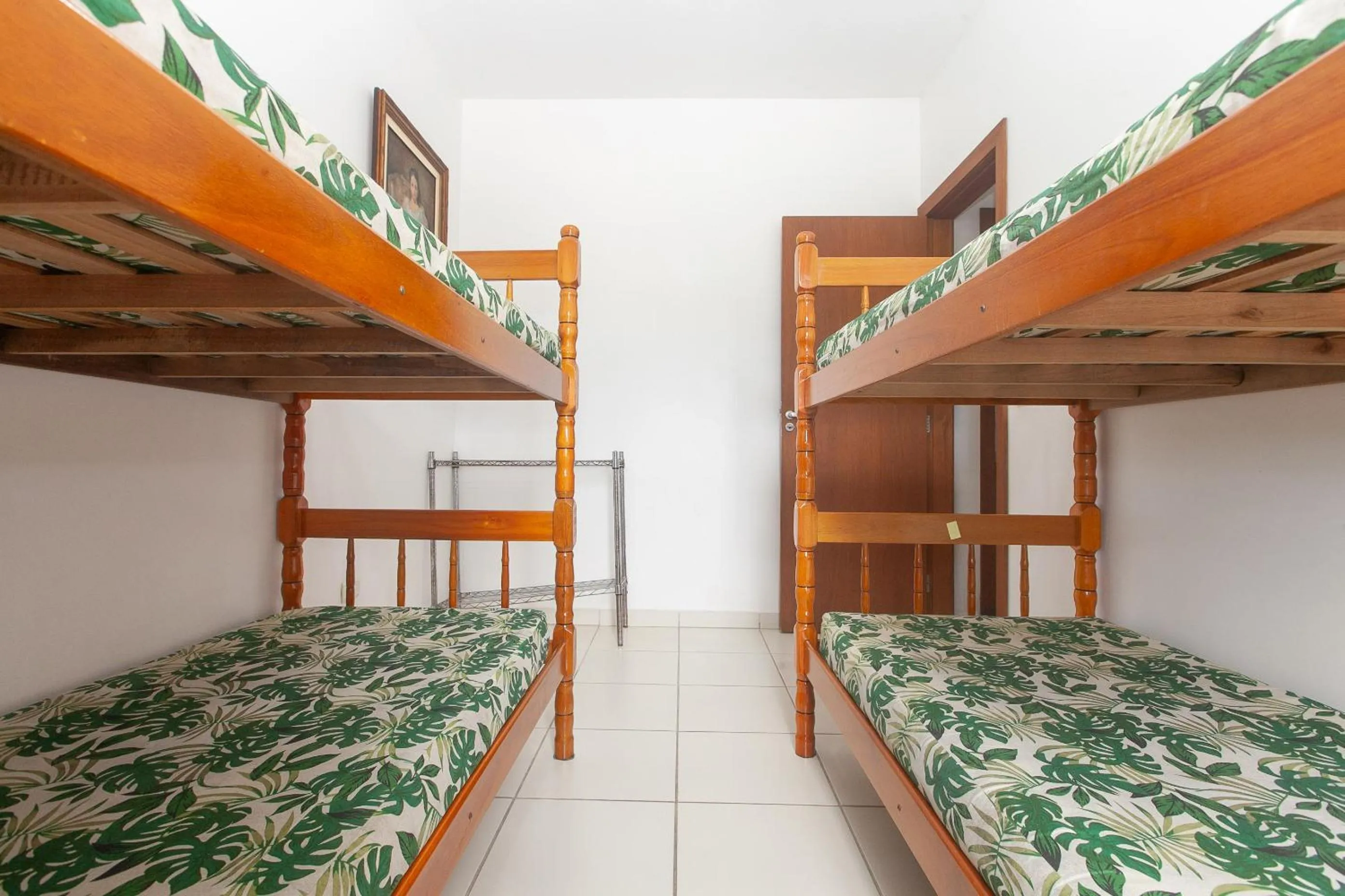 Bedroom, Bed in Apartamento Erica Itaguá proximo da Praia Grande