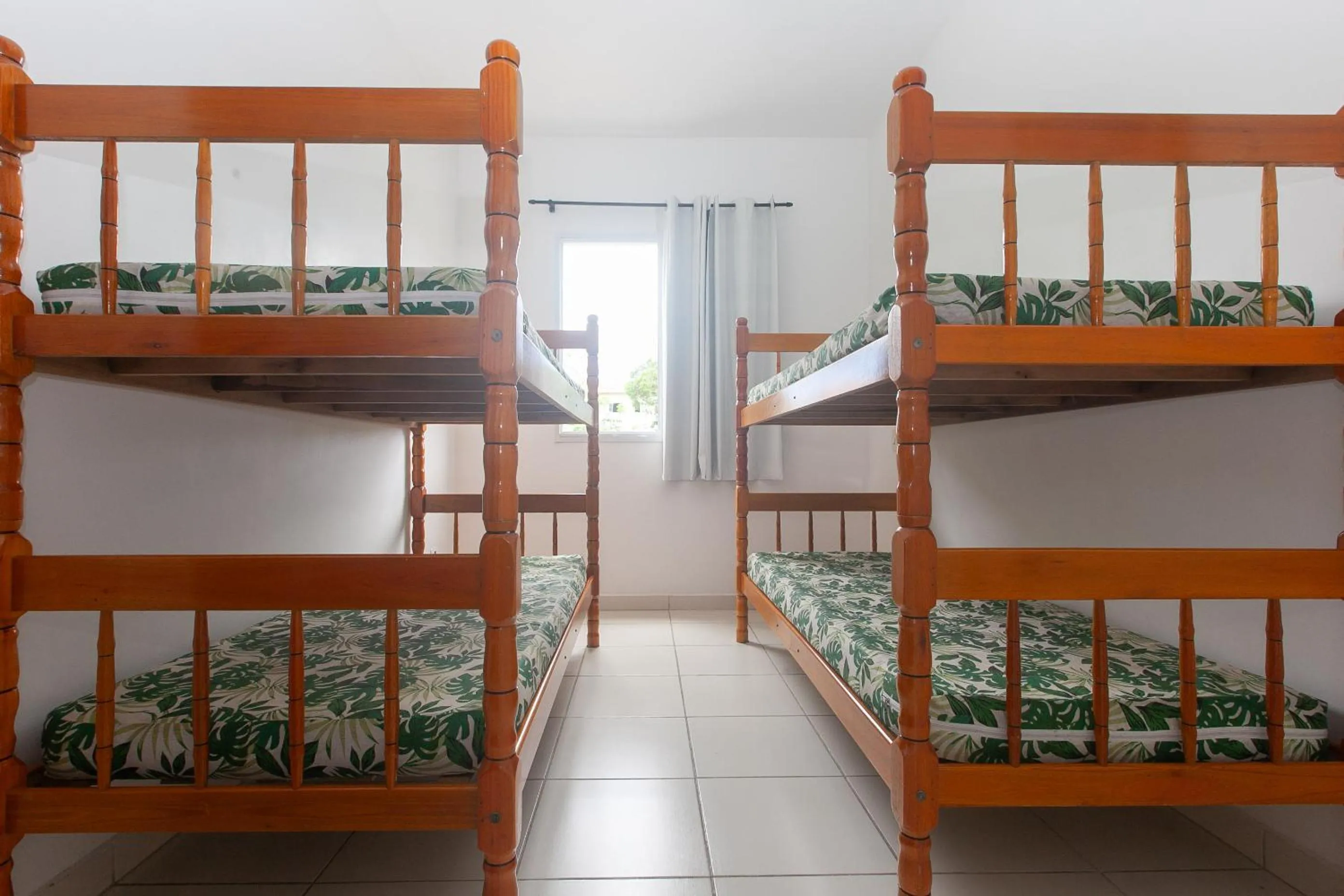 Bedroom, Bed in Apartamento Erica Itaguá proximo da Praia Grande