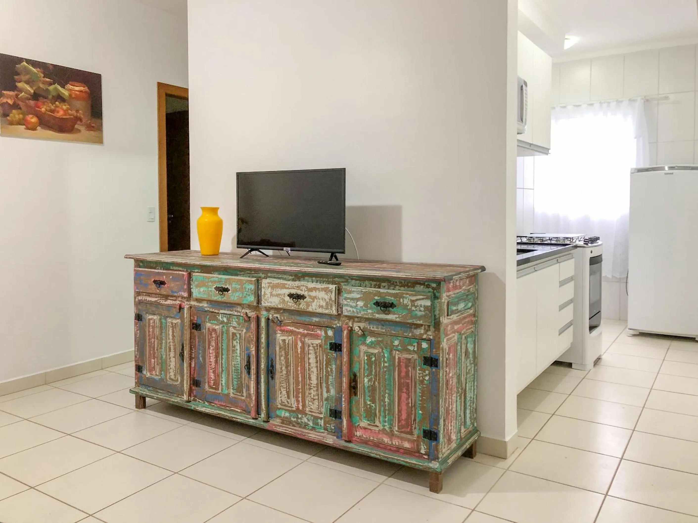 Communal lounge/ TV room in Apartamento Erica Itaguá proximo da Praia Grande