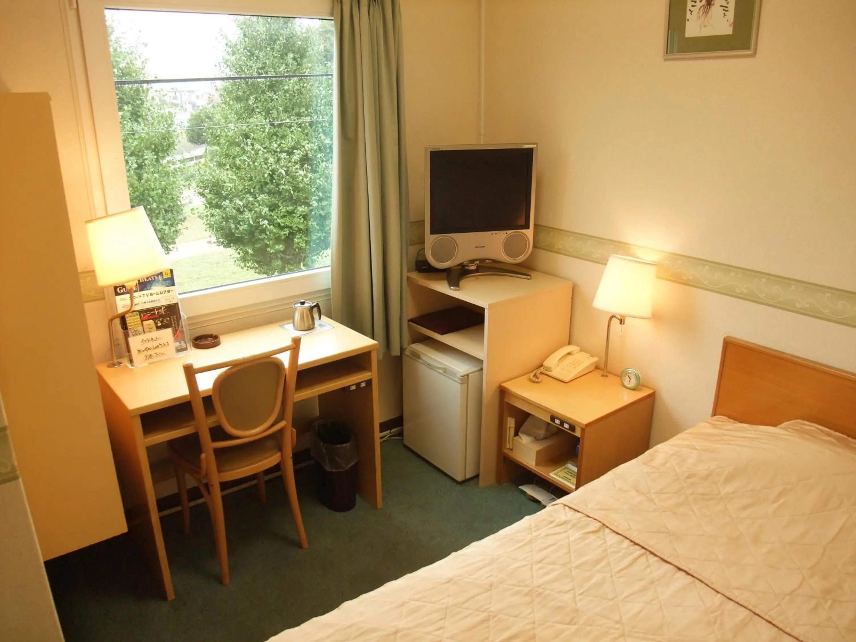 Bed in Maebashi Business Hotel Luka