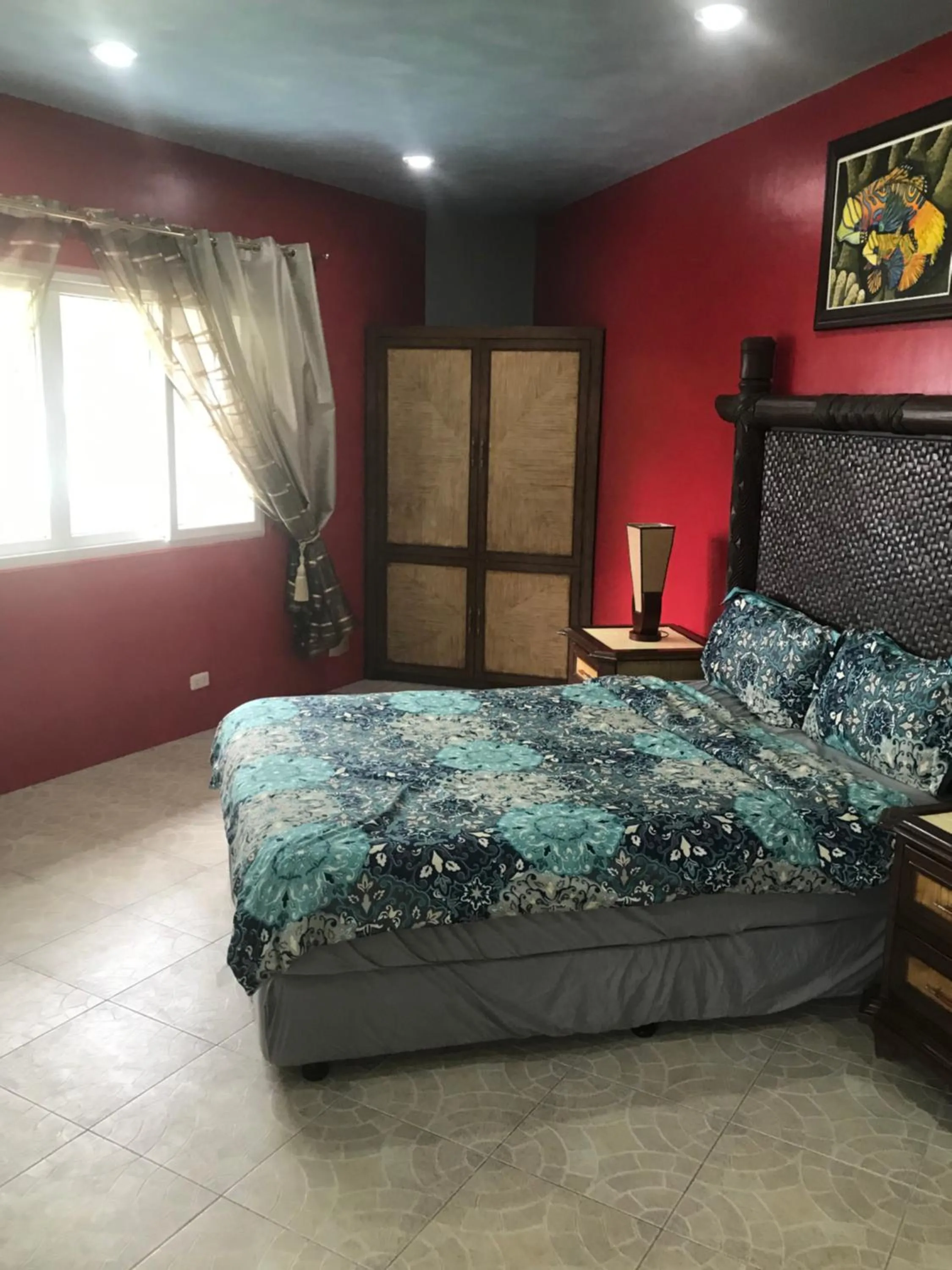 Bed in Cabilao Sunset Dive & Beach Resort