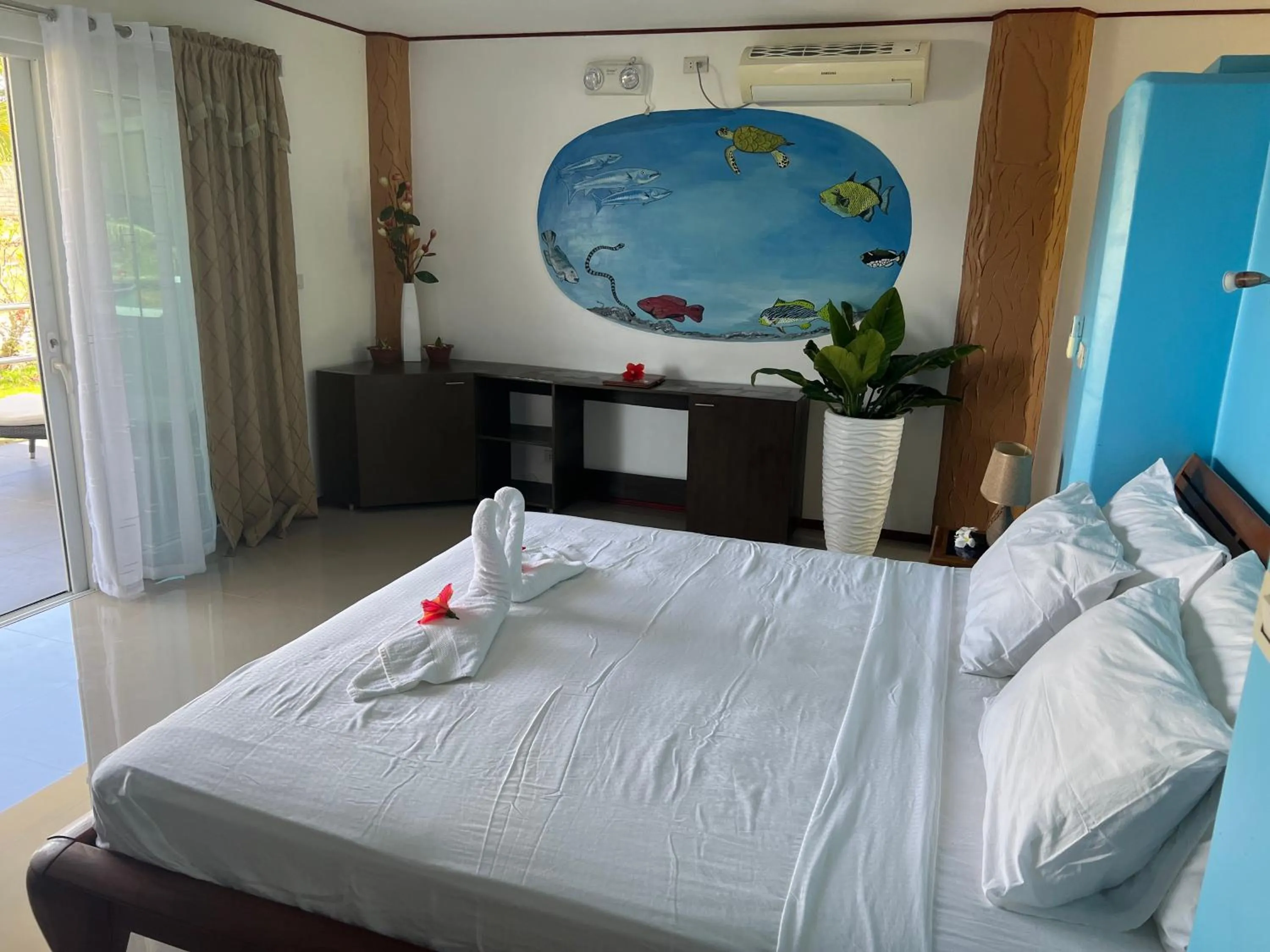 Bed in Cabilao Sunset Dive & Beach Resort