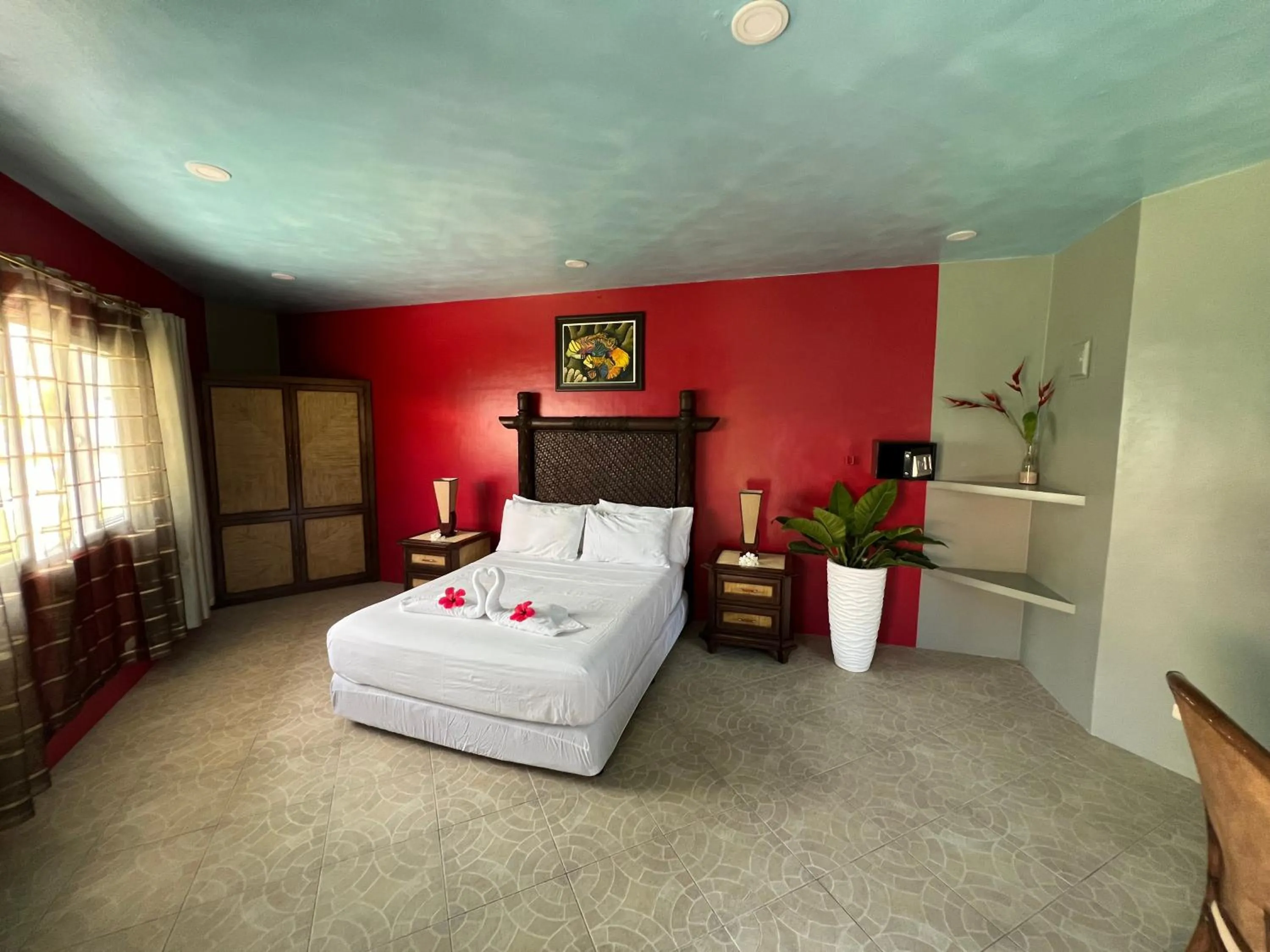 Bed in Cabilao Sunset Dive & Beach Resort