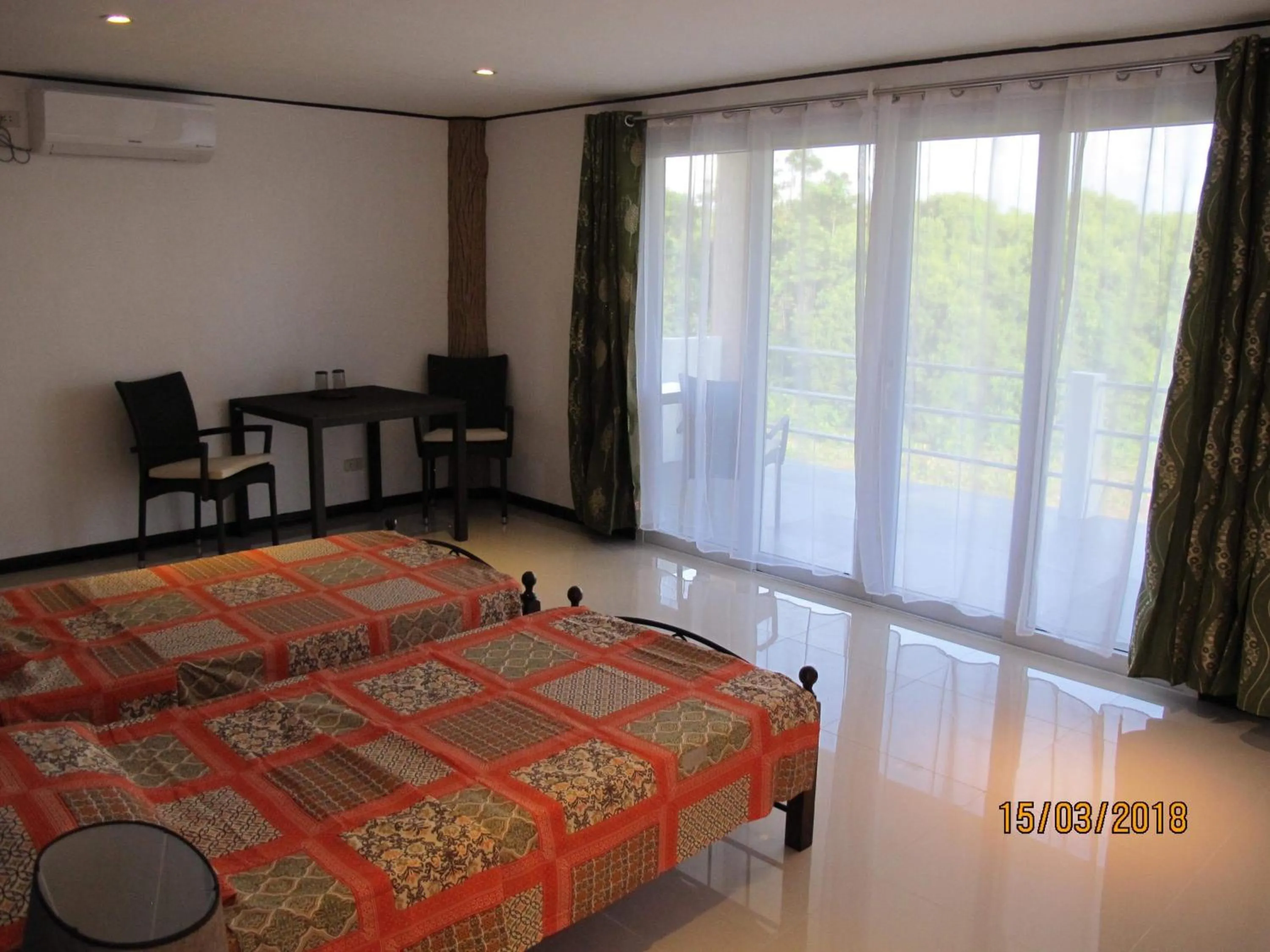 Bed in Cabilao Sunset Dive & Beach Resort