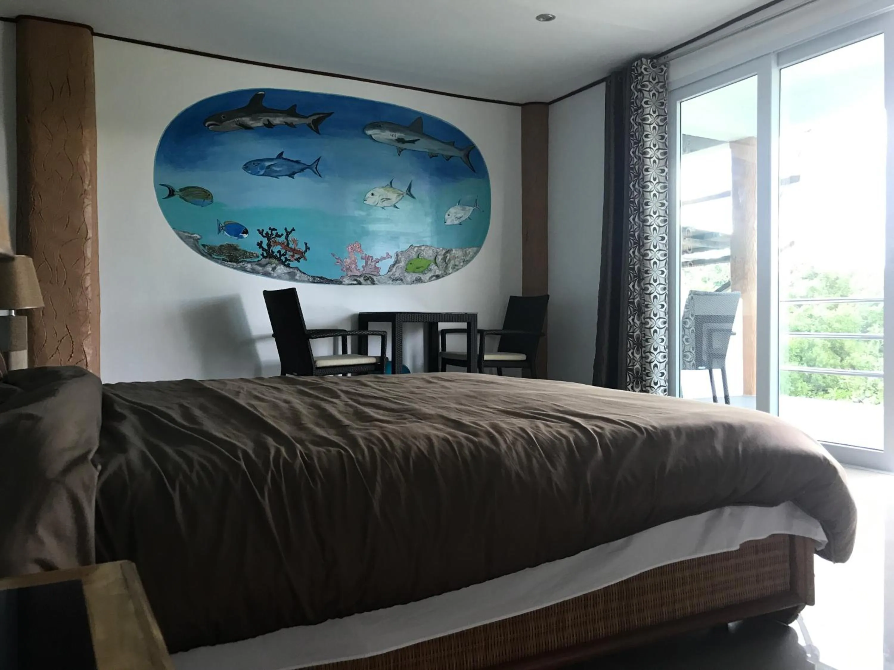 Bed in Cabilao Sunset Dive & Beach Resort