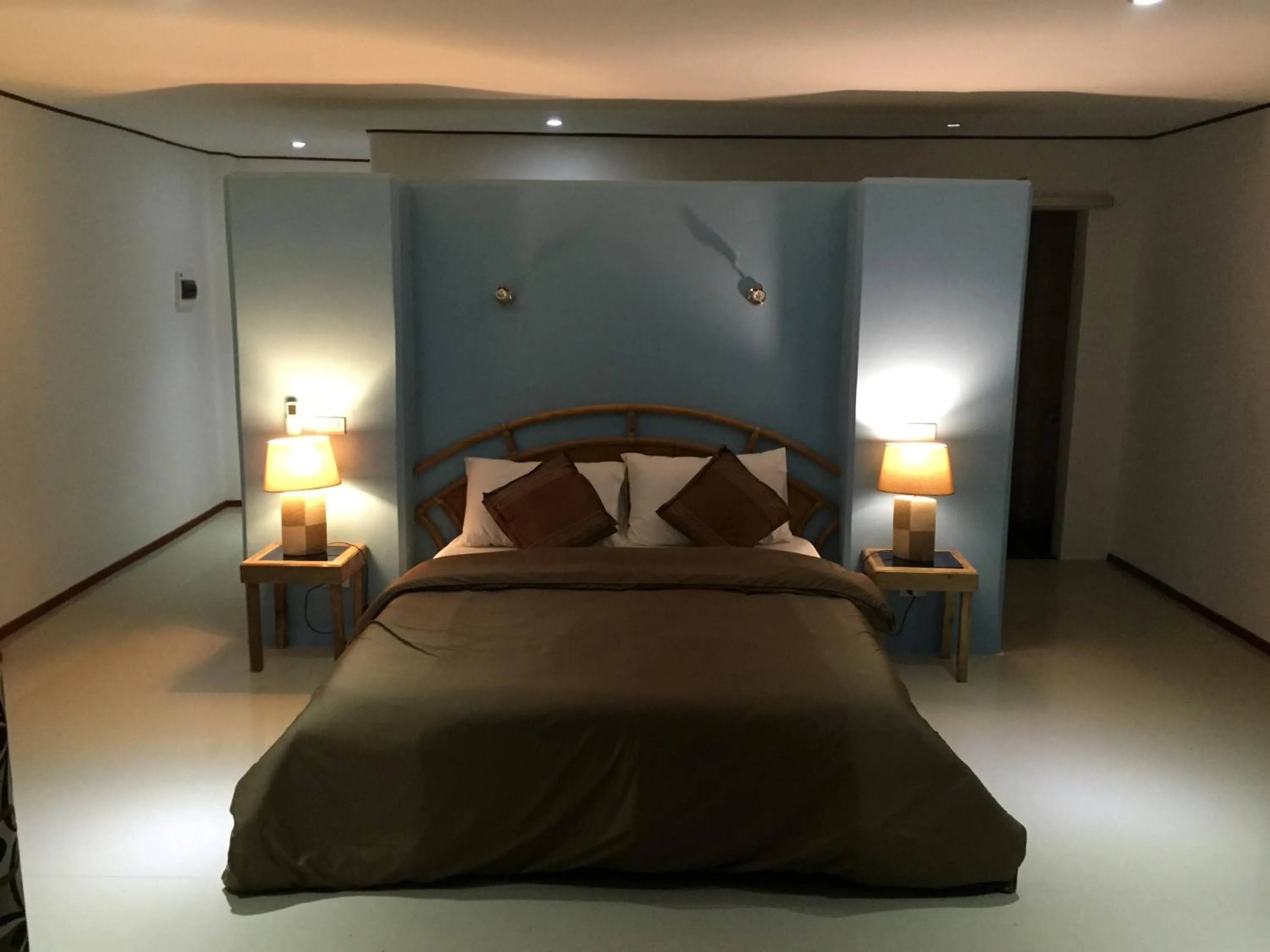 Bed in Cabilao Sunset Dive & Beach Resort