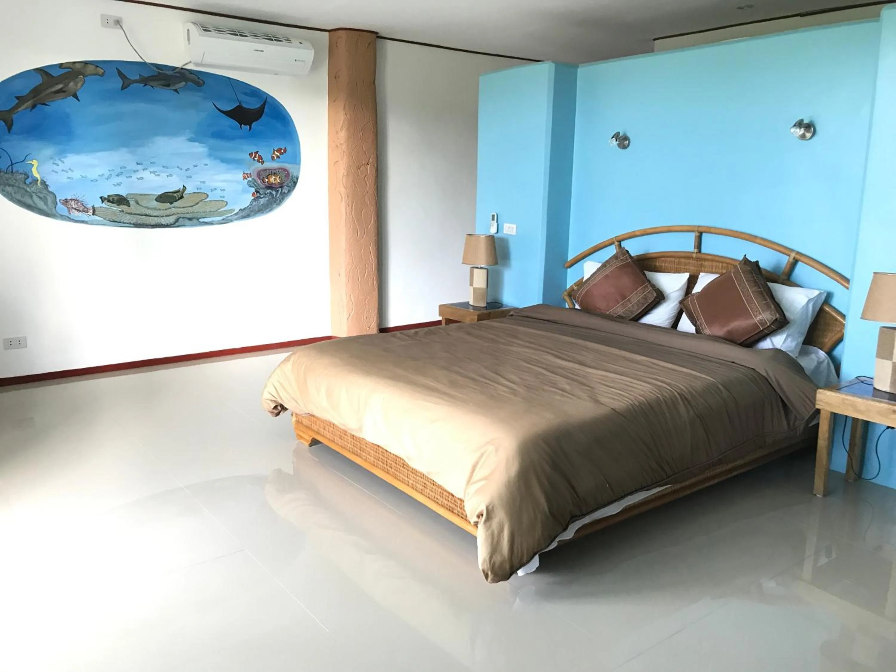 Bed in Cabilao Sunset Dive & Beach Resort