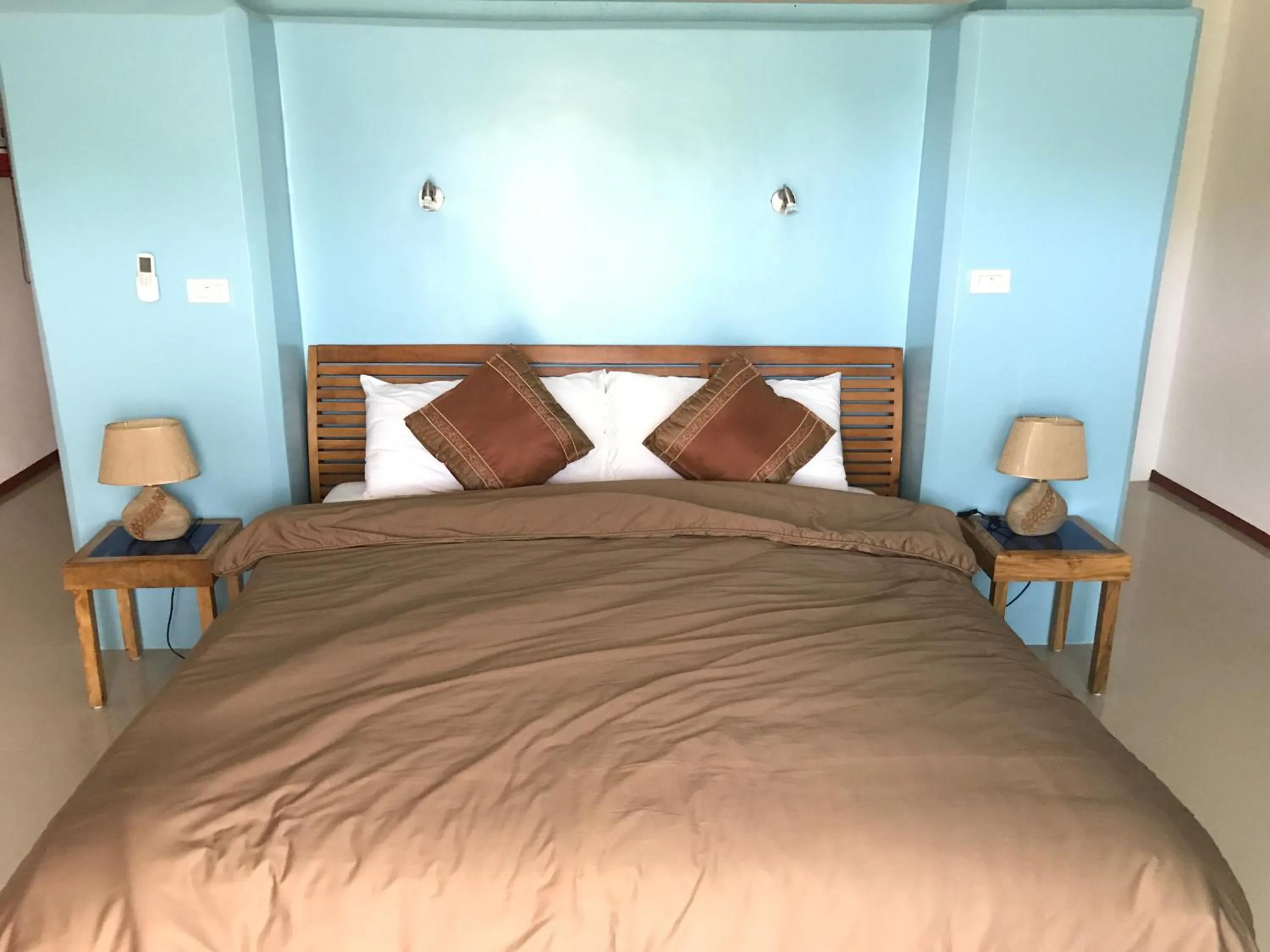 Bed in Cabilao Sunset Dive & Beach Resort