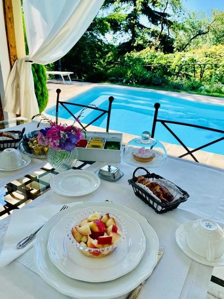 Pool view in Relais Torre Dei Torti - Luxury Bed and Breakfast