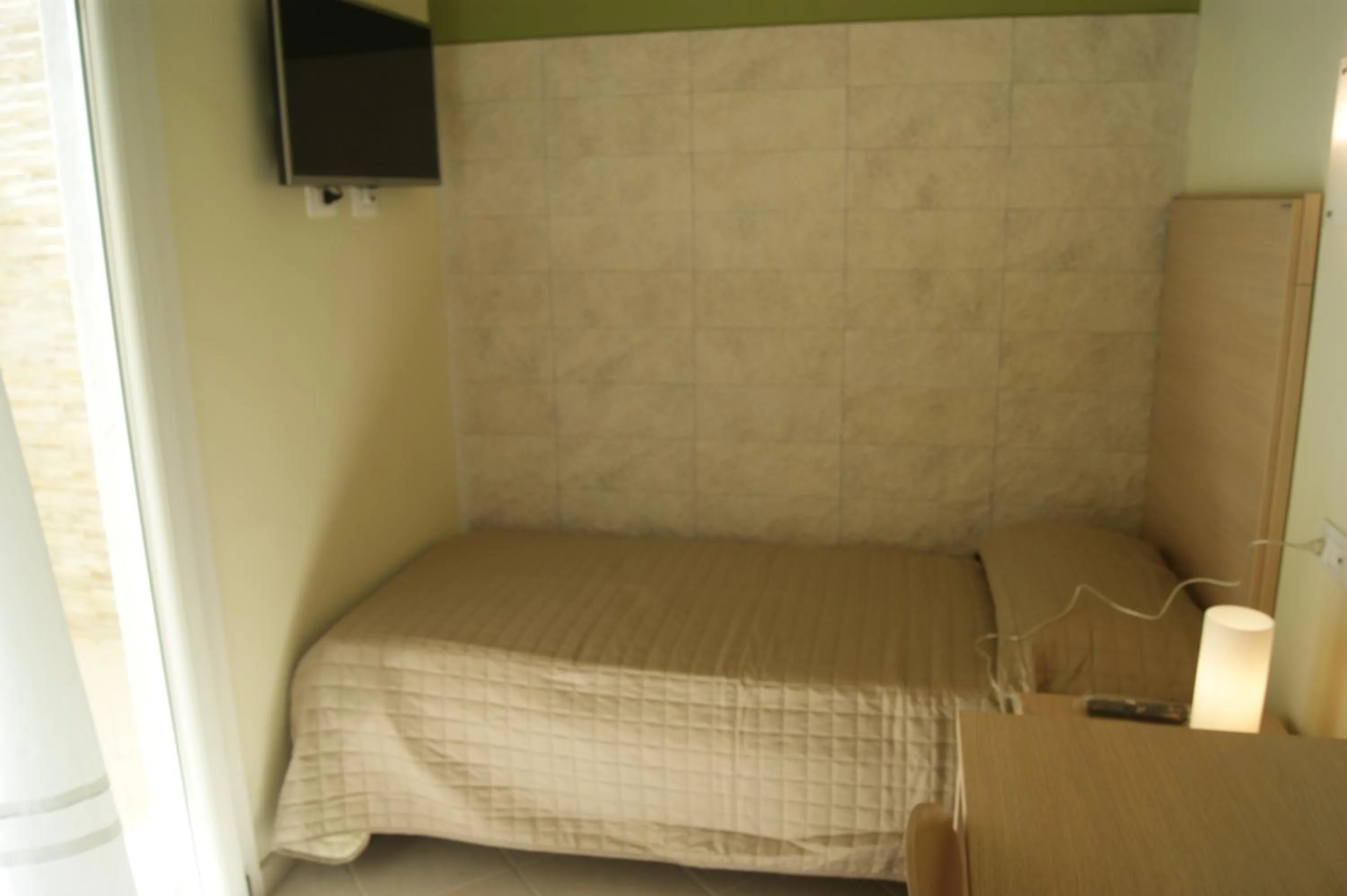 Bed in Guest House Golfo Xifonio