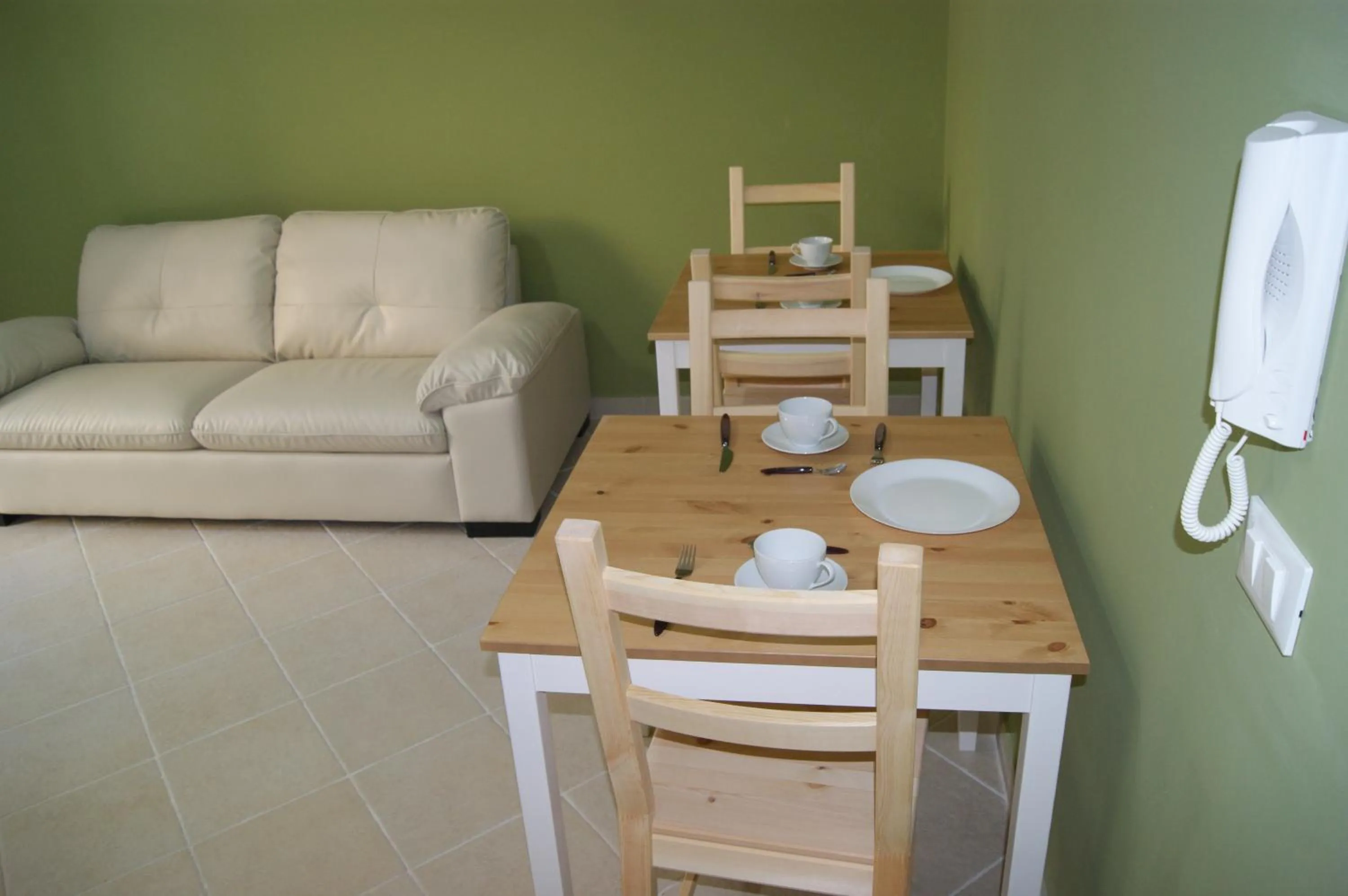 Communal lounge/ TV room in Guest House Golfo Xifonio