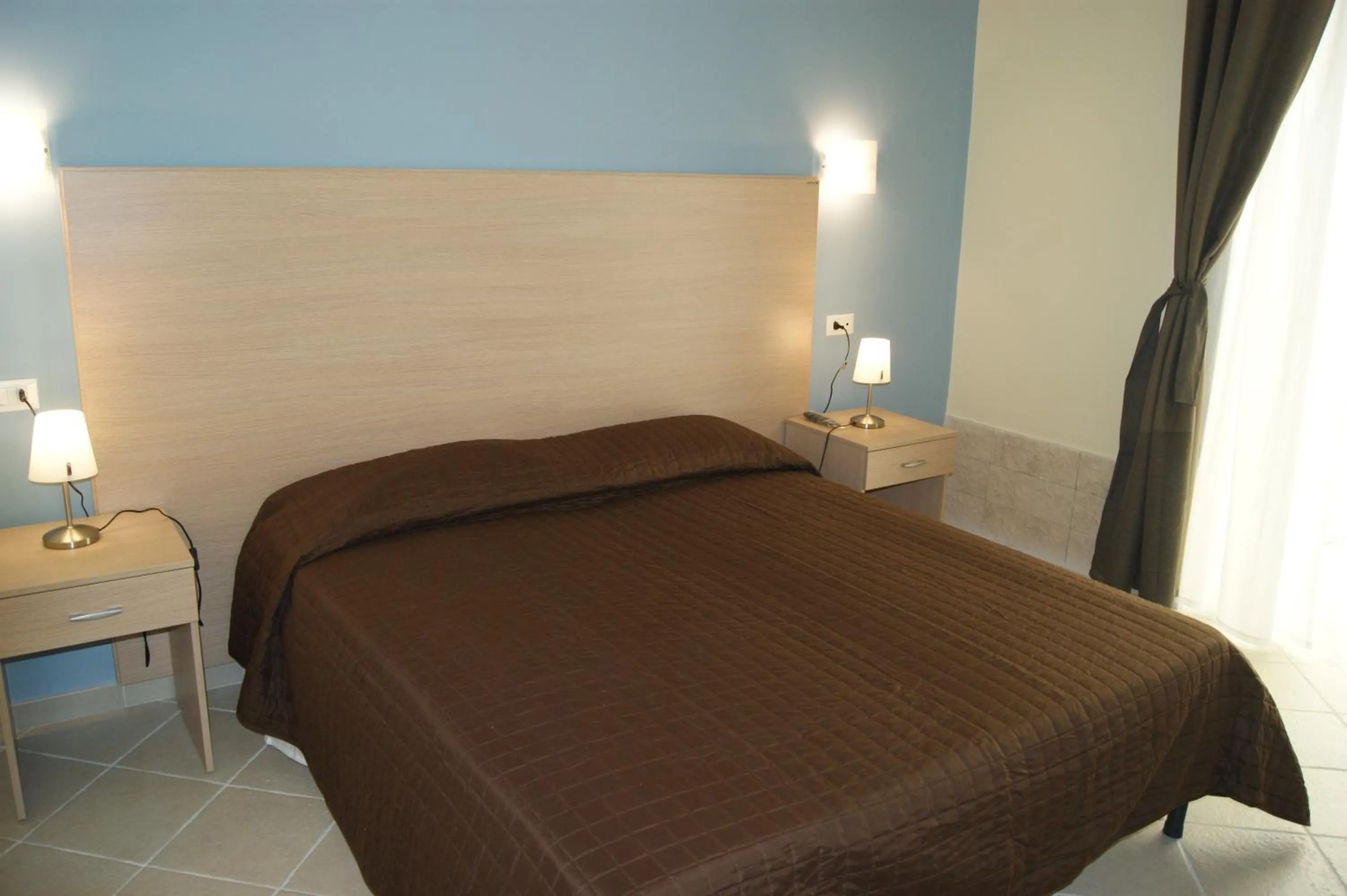 Bed in Guest House Golfo Xifonio