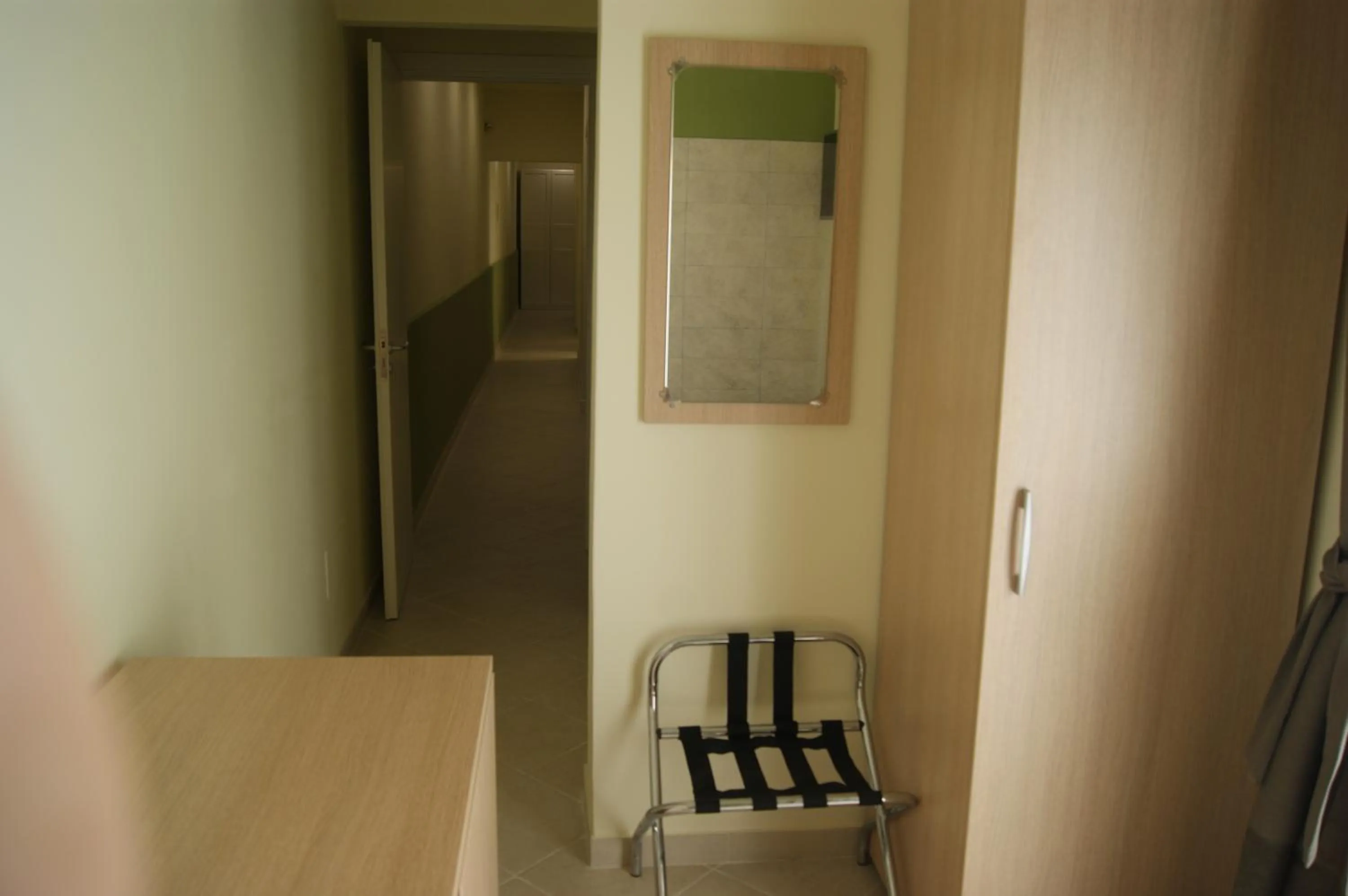 Photo of the whole room in Guest House Golfo Xifonio