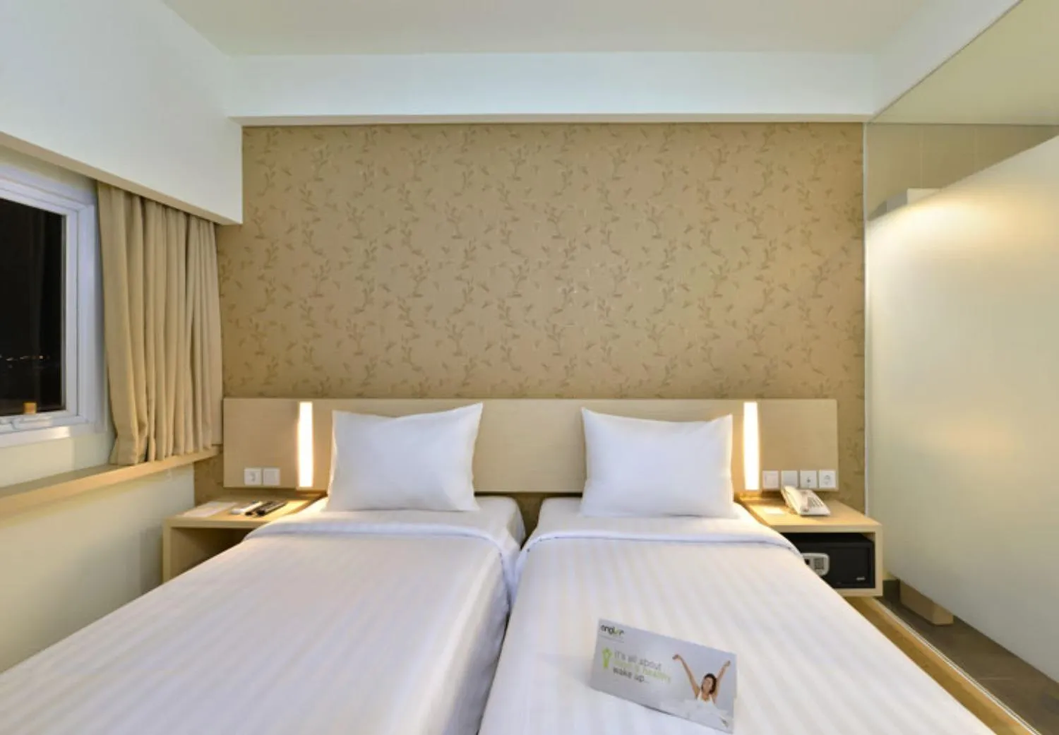 Bed in Whiz Prime Hotel Sudirman Cilacap