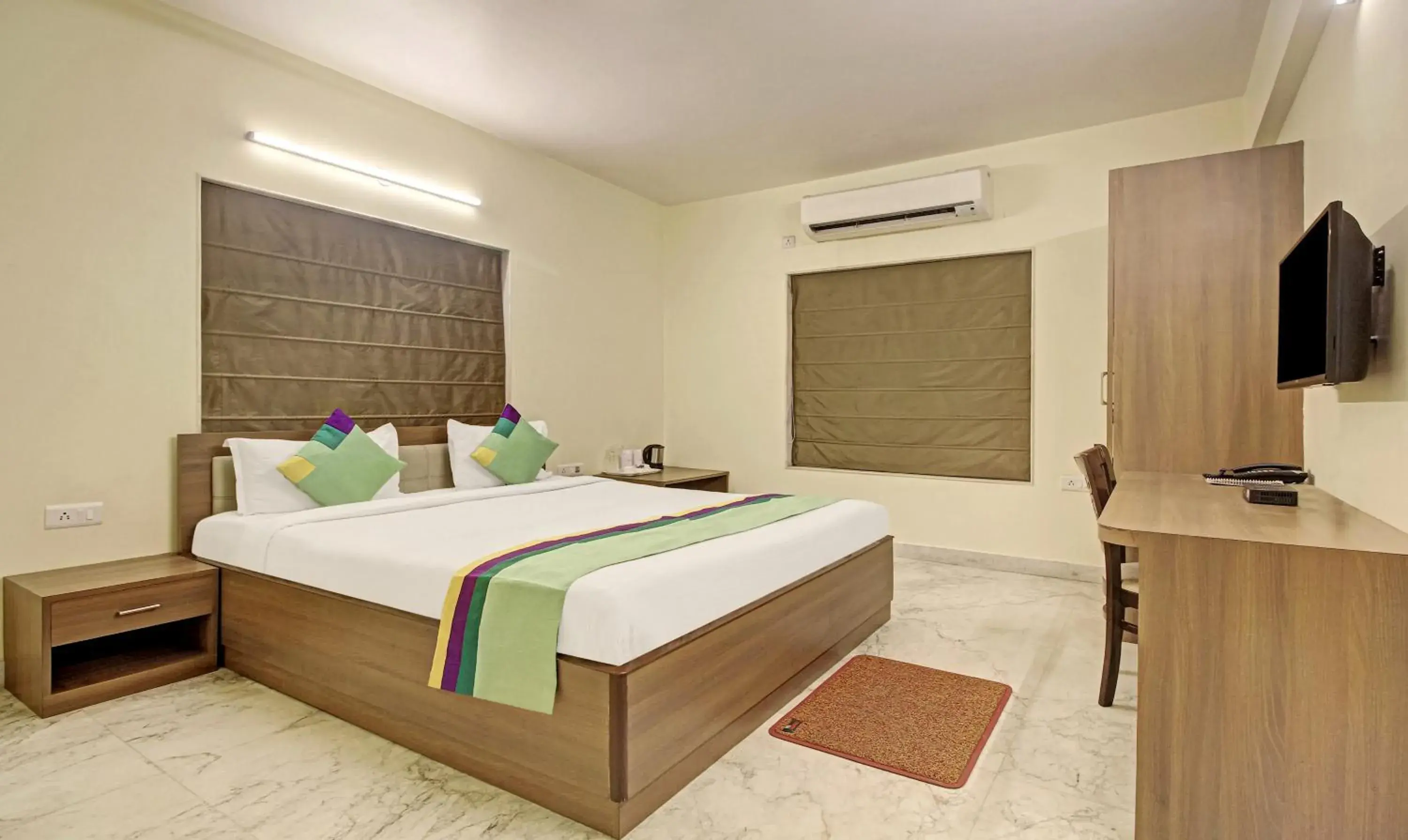 Bedroom, Bed in Treebo Sreemaa Newtown Near Biswa Bangla Gate Bedroom, Bed in Treebo Sreemaa Newtown Near Biswa Bangla Gate