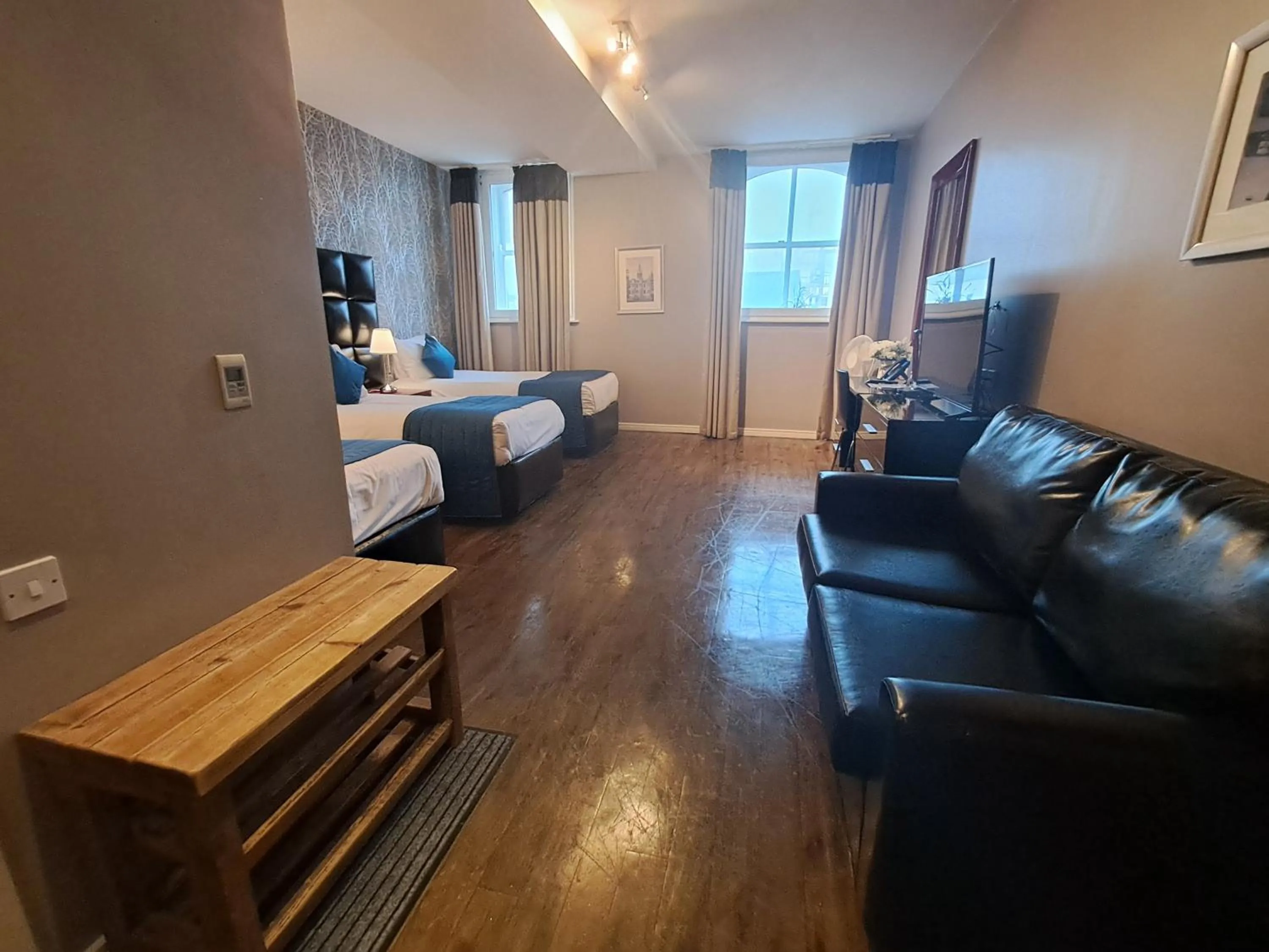 Seating area, Bed in The Royal Hotel Cardiff