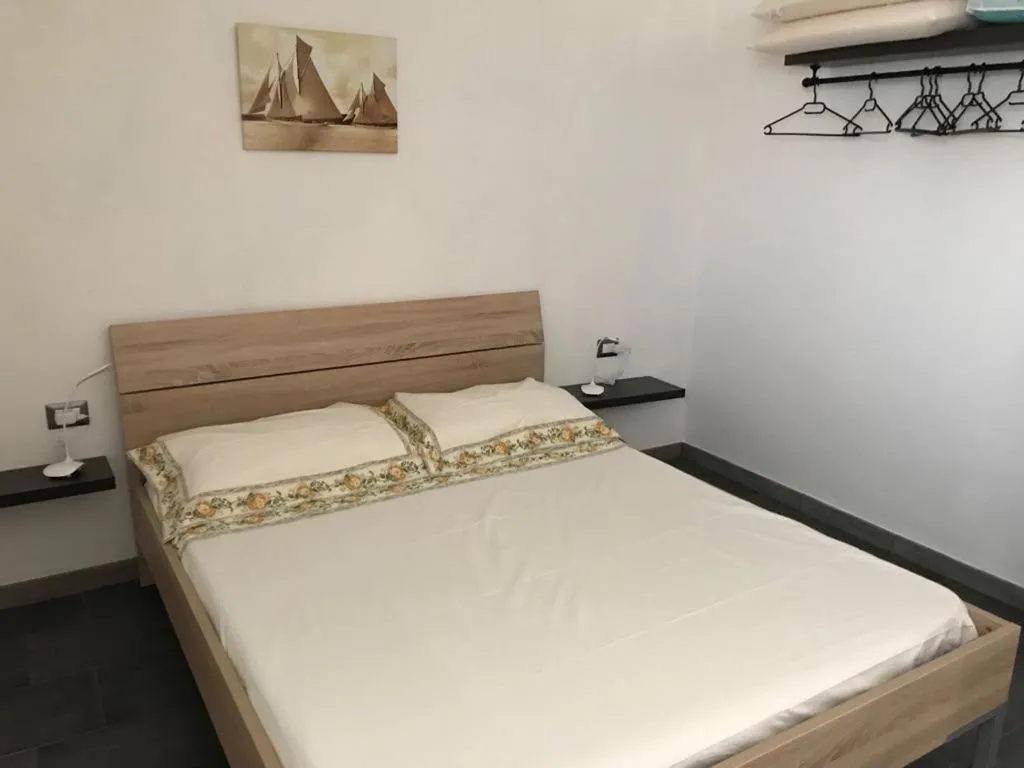 Bedroom, Bed in Appartamento Rosmarino
